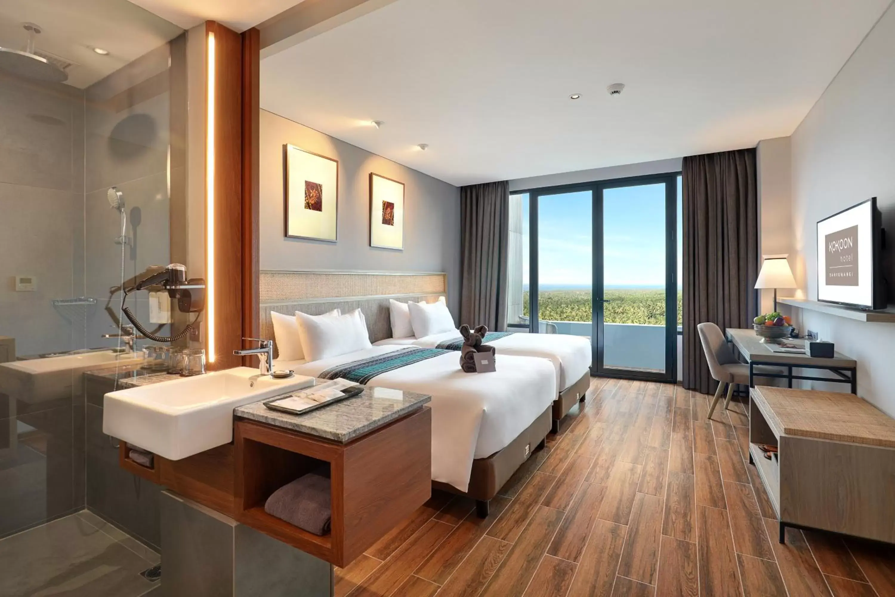 Deluxe Double or Twin Room with Balcony in Kokoon Hotel Banyuwangi Deluxe Double or Twin Room with Balcony in Kokoon Hotel Banyuwangi