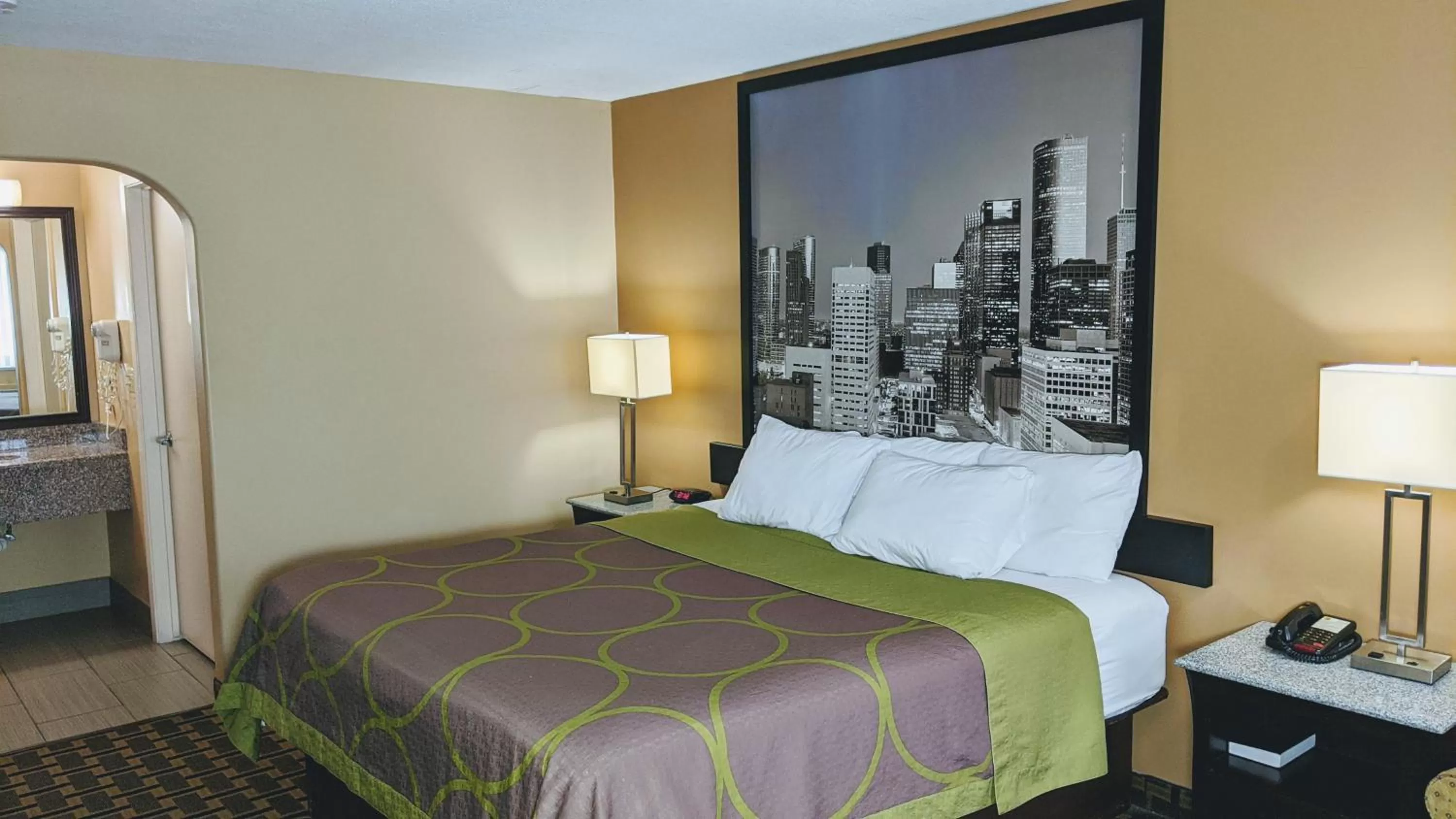 Bed in Super 8 by Wyndham Willowbrook Houston