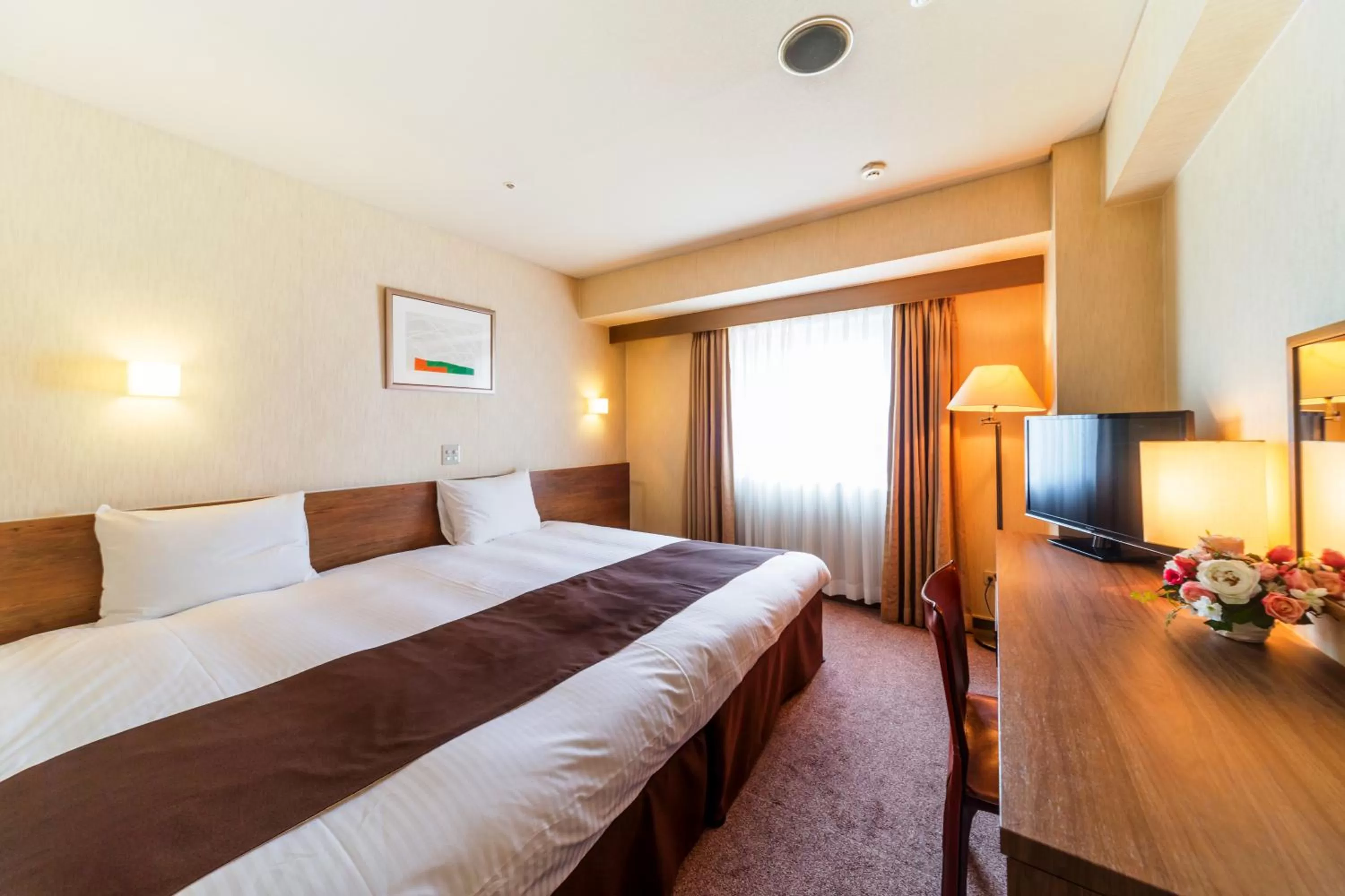 Photo of the whole room, Bed in Nest Hotel Sapporo Odori