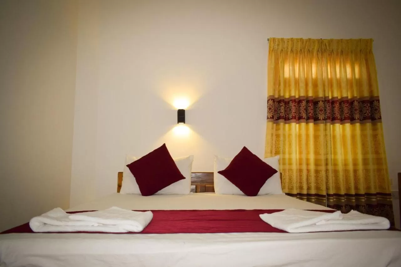 Bed in Hotel Theevanni Inn