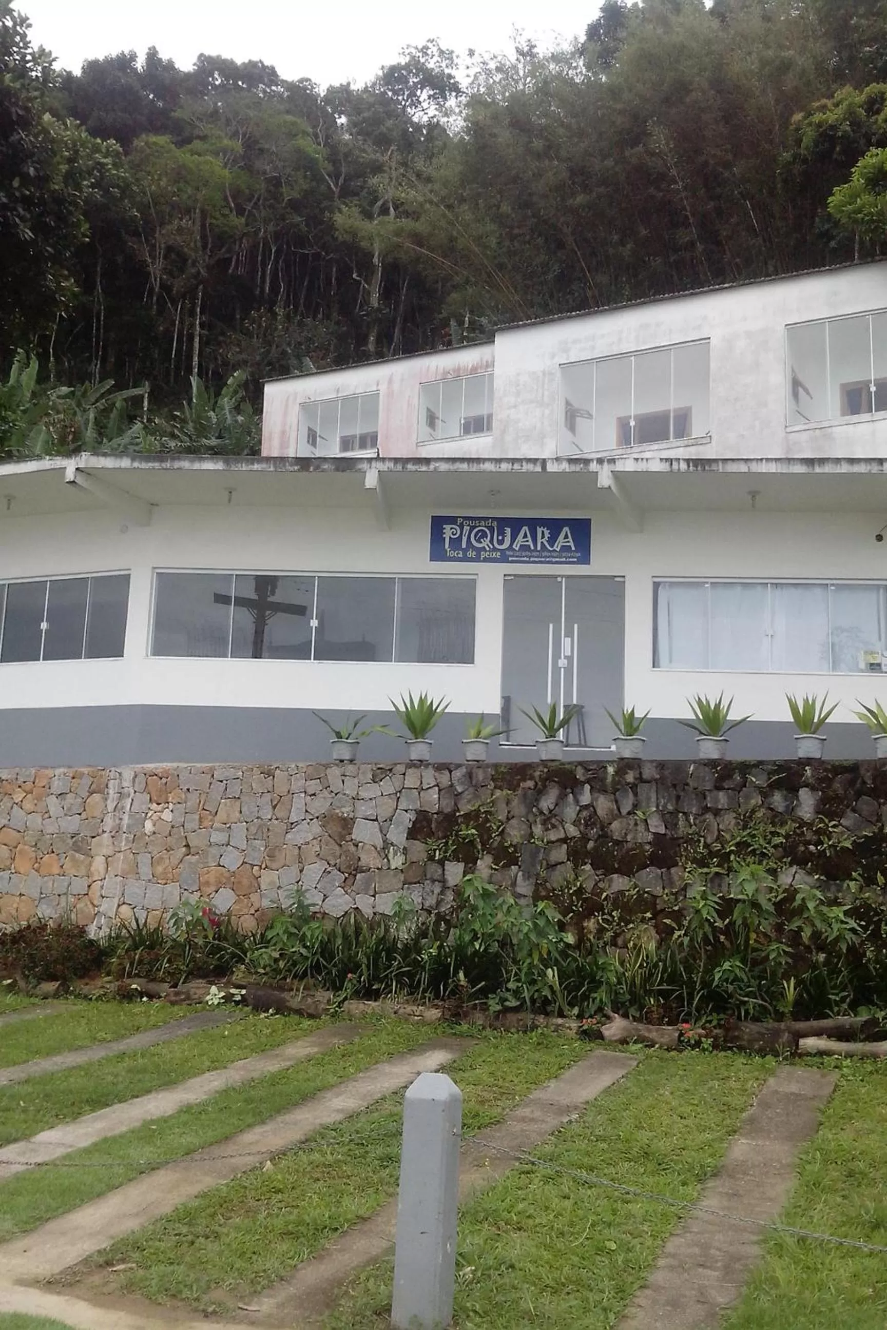 Property logo or sign in Pousada Piquara