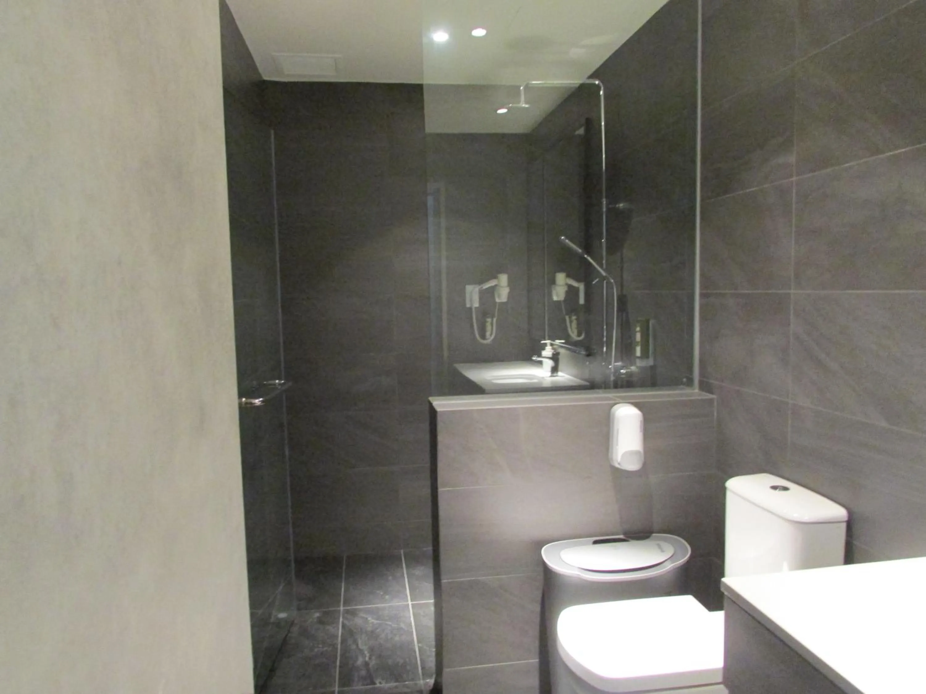 Shower in Aerotel Singapore - Transit Hotel in Terminal 1