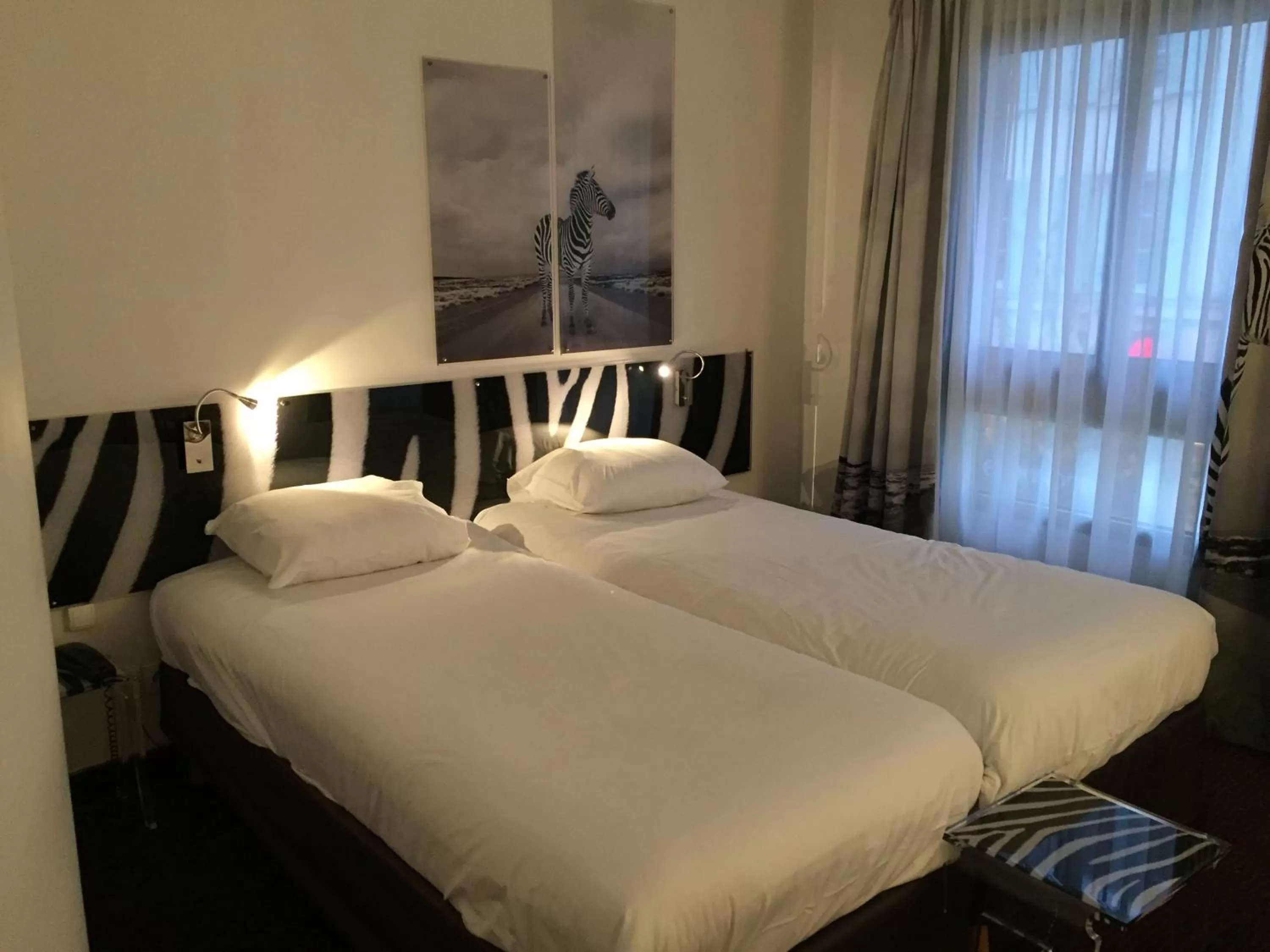 Photo of the whole room, Bed in Hotel Le Cardinal Rueil Centre