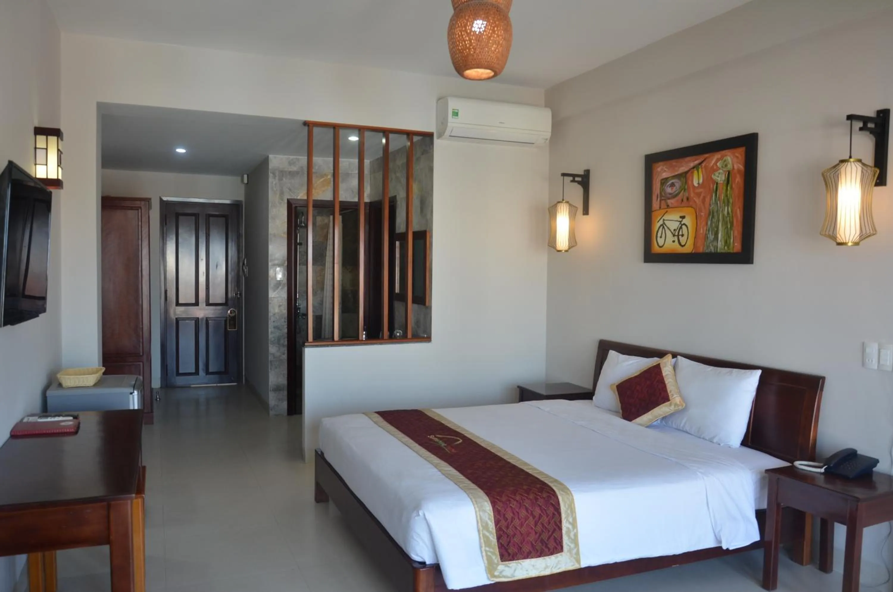 Bed in Sunshine Hoian Hotel