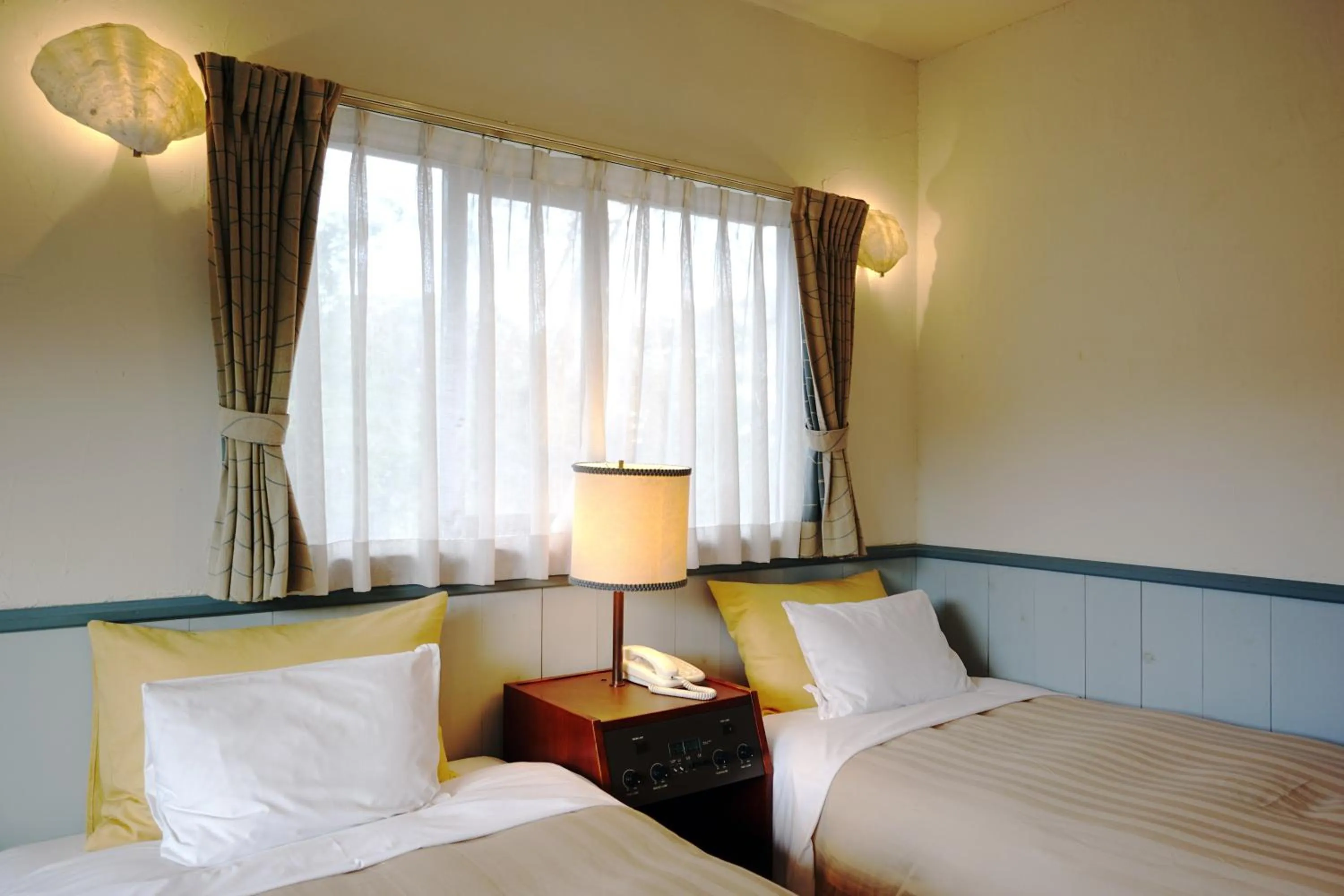 Bed in Gardenvilla Shirahama