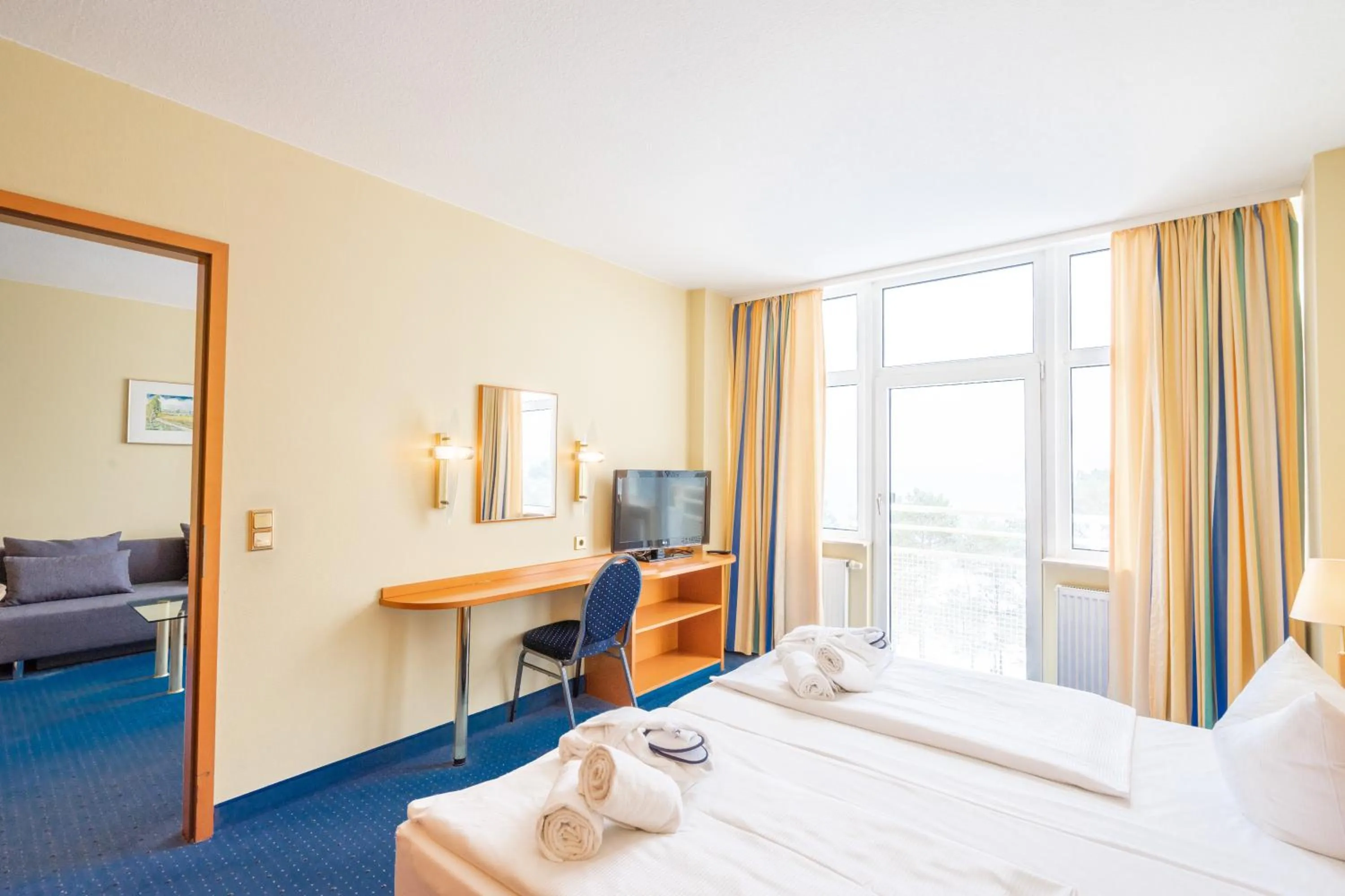 Living room, Bed in Arkona Strandhotel