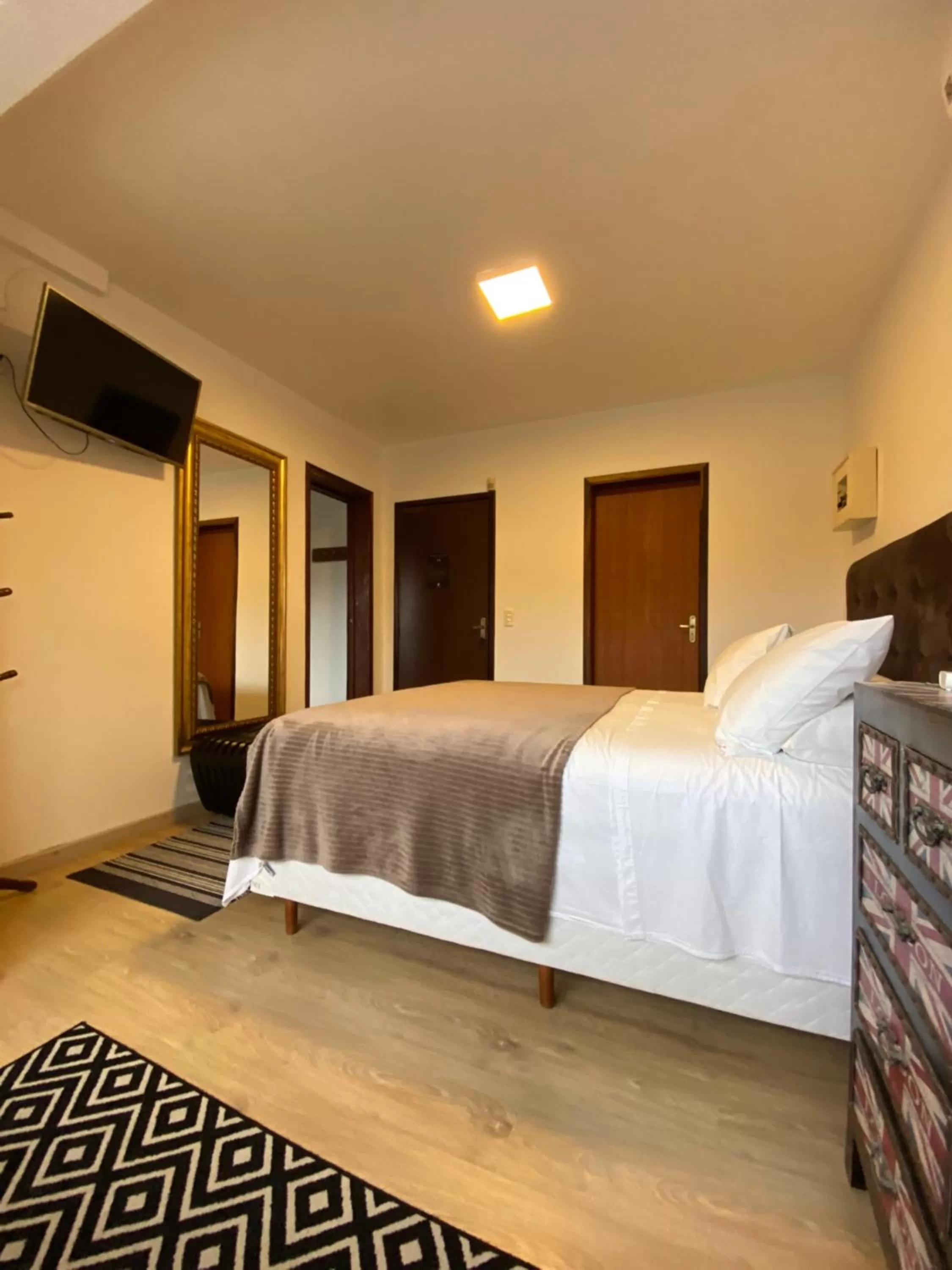 Bed in Pousada Casa da Praia