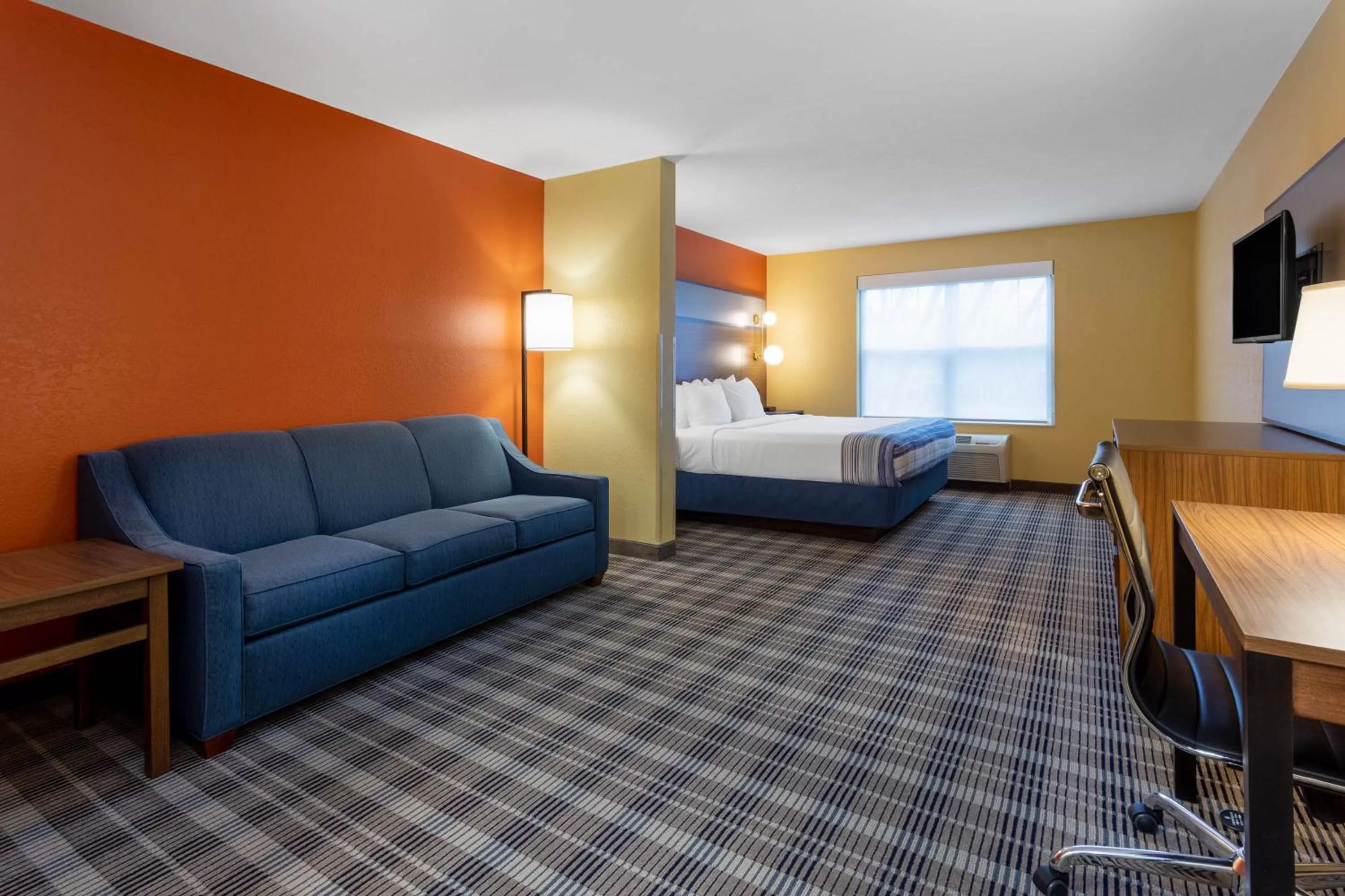 Bed in AmericInn by Wyndham Fulton Clinton