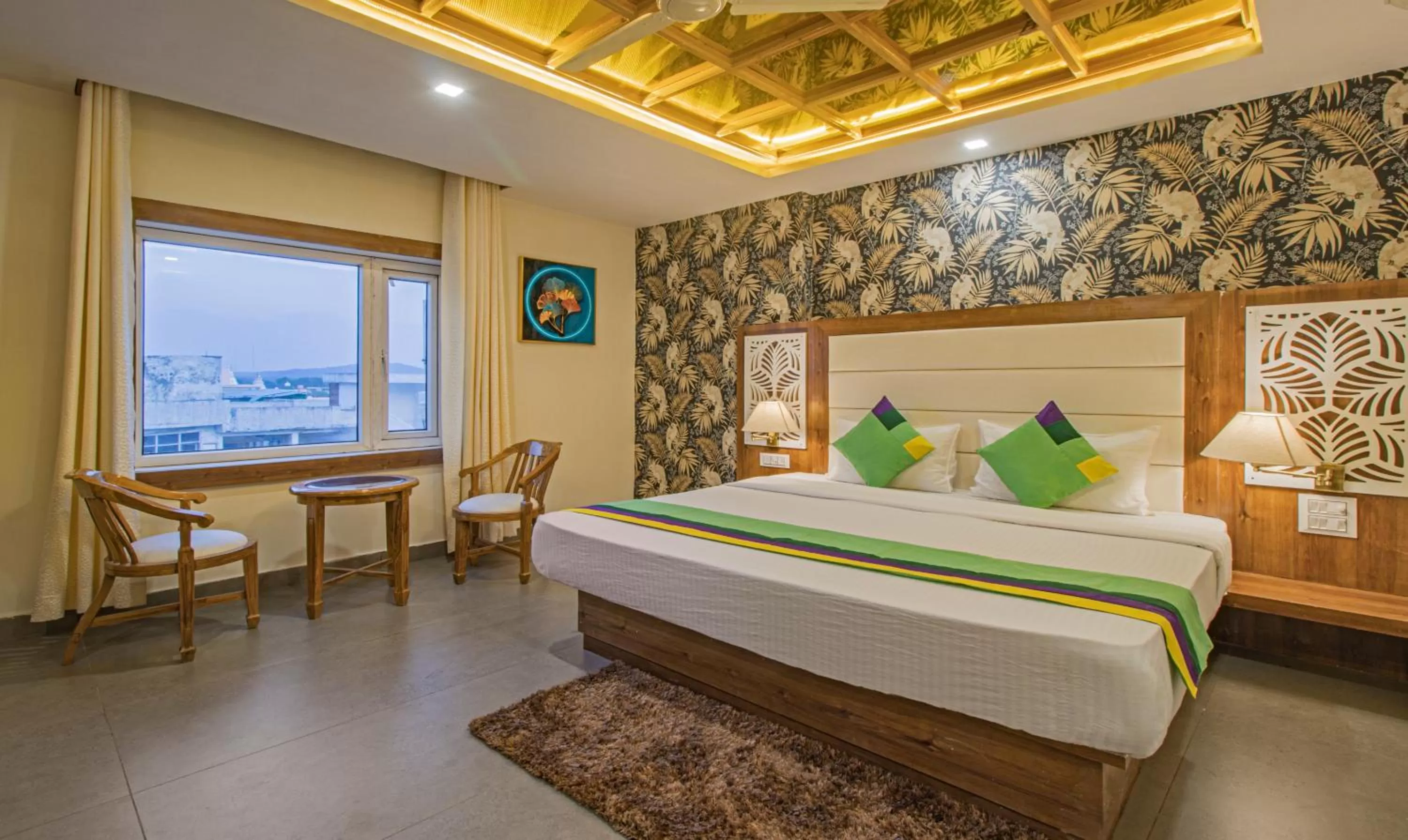 Bed in Treebo Trend Haveli Resort Roots Bhupatwala