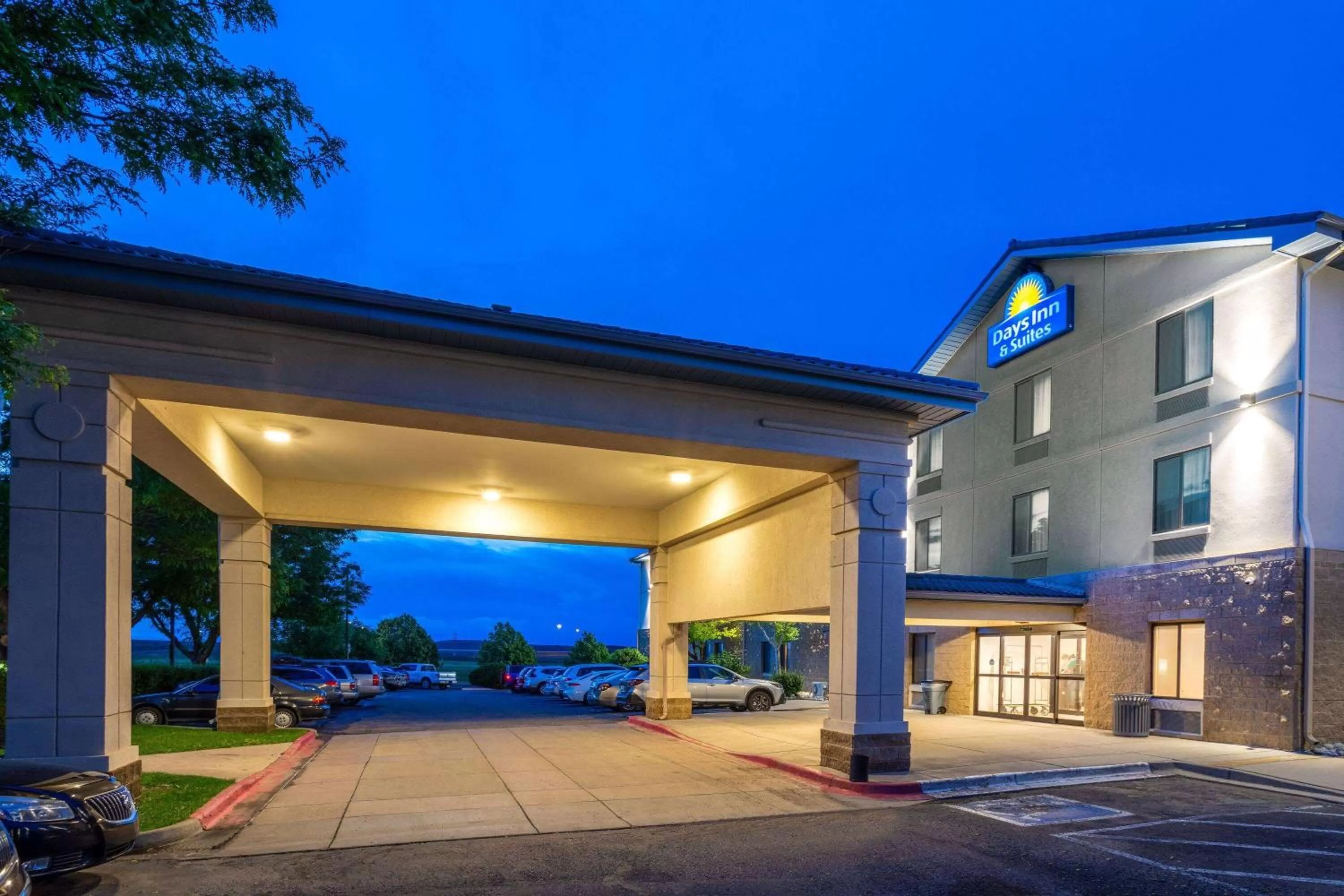 Property building in Days Inn & Suites by Wyndham Denver International Airport