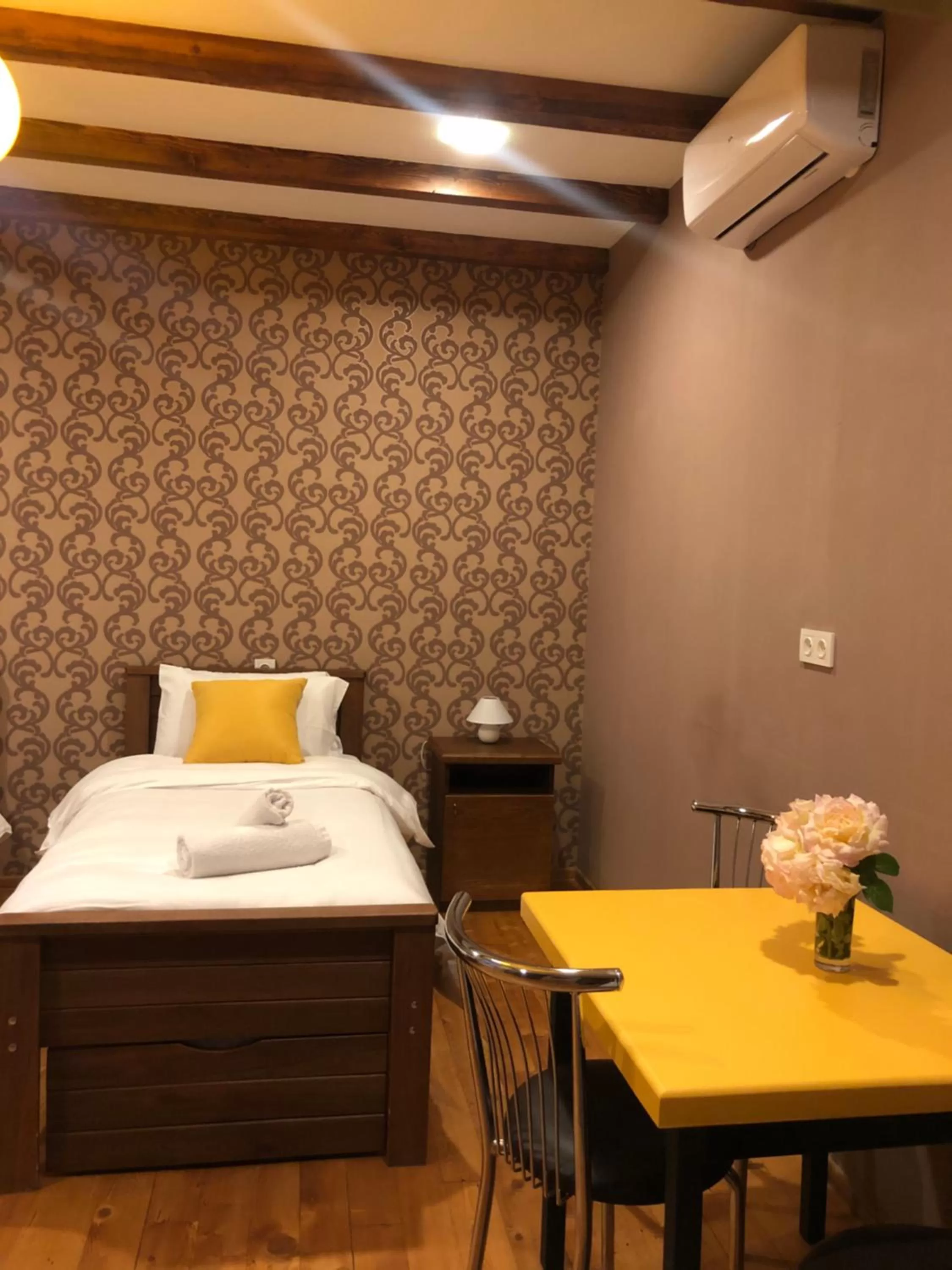 Bed in Borjomi Yellow Hotel