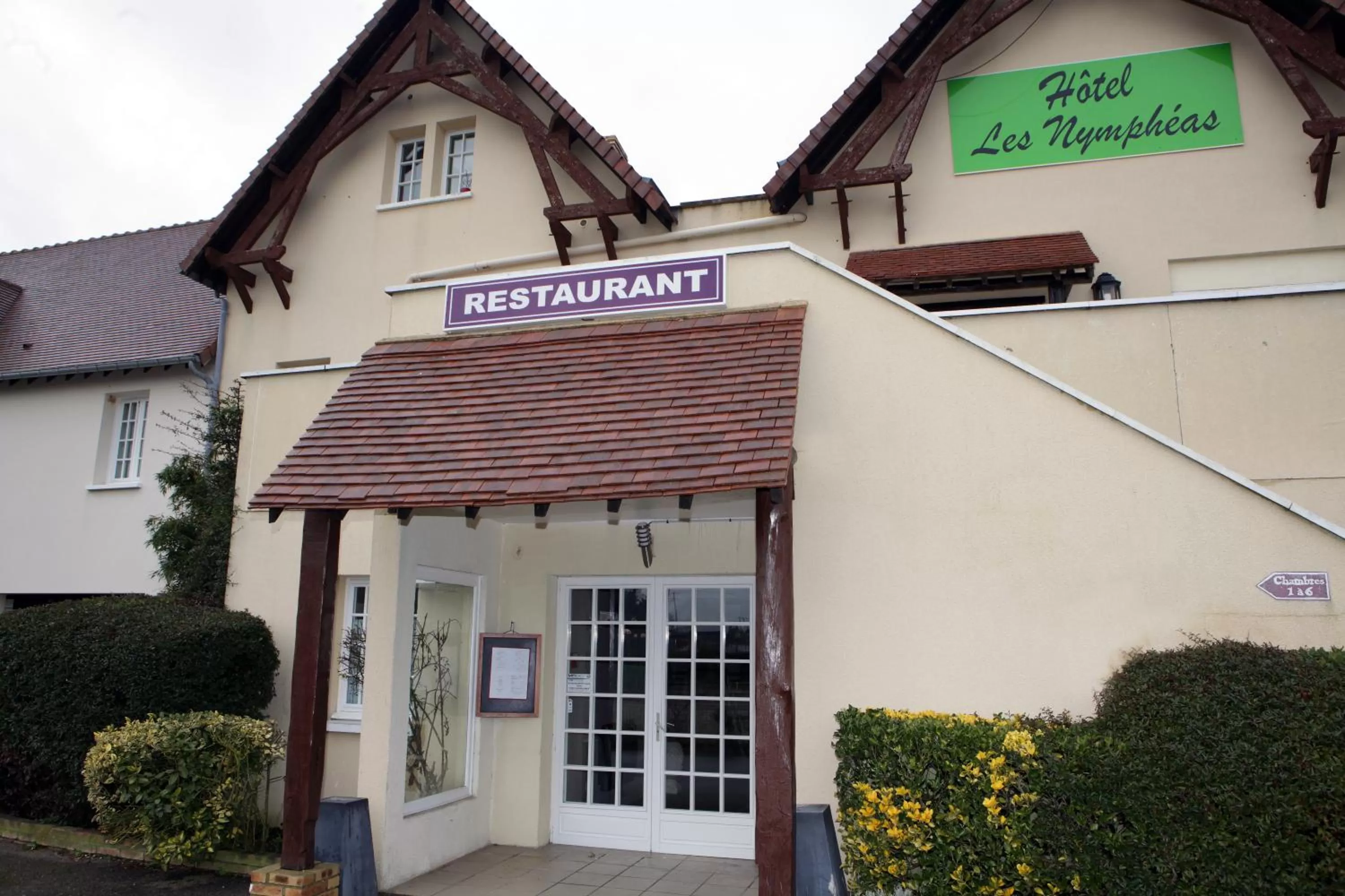 Property building in Logis Hôtel Les Nymphéas