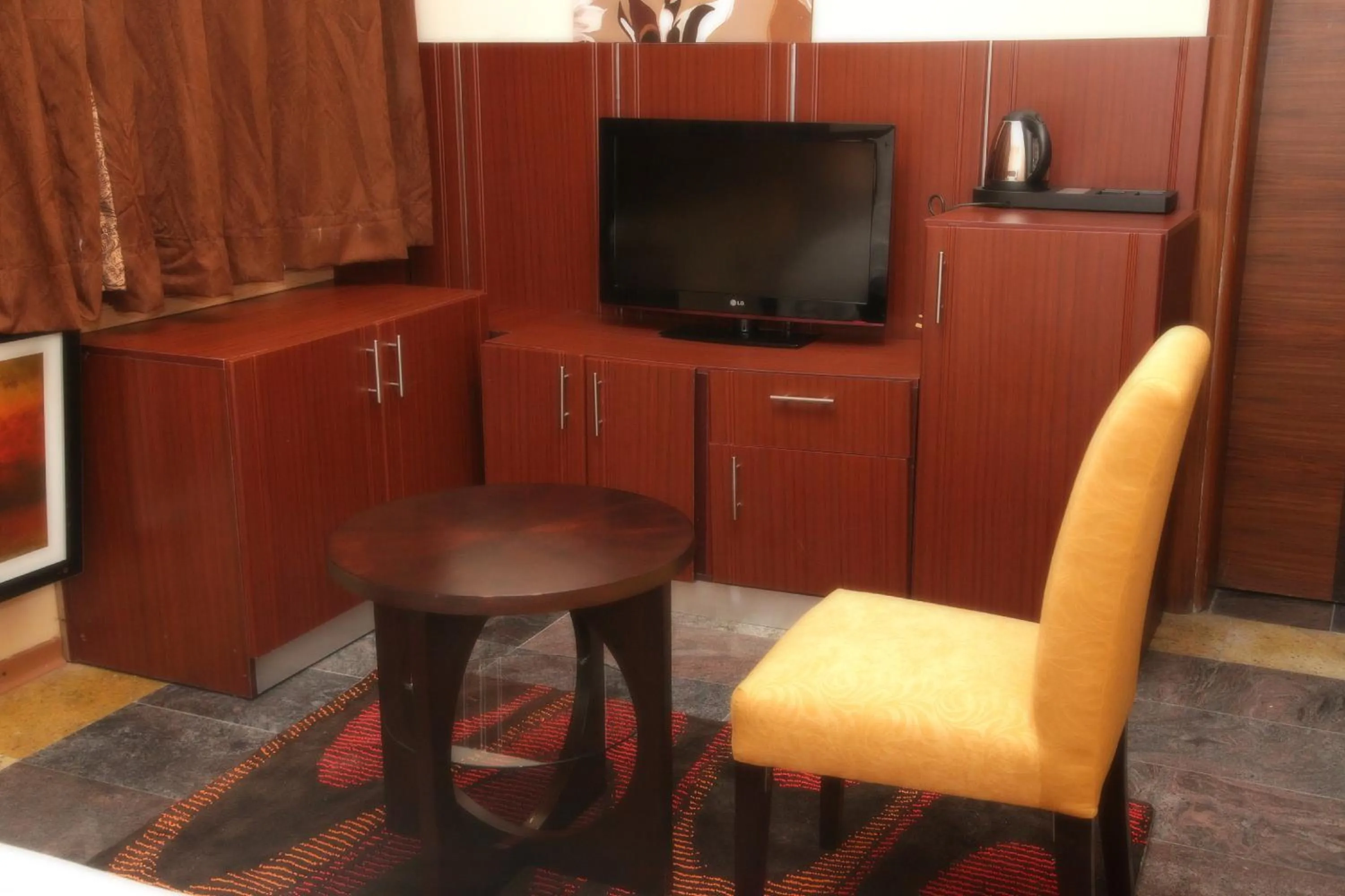 Seating area, TV/Entertainment Center in Swiss International Mabisel Port Harcourt