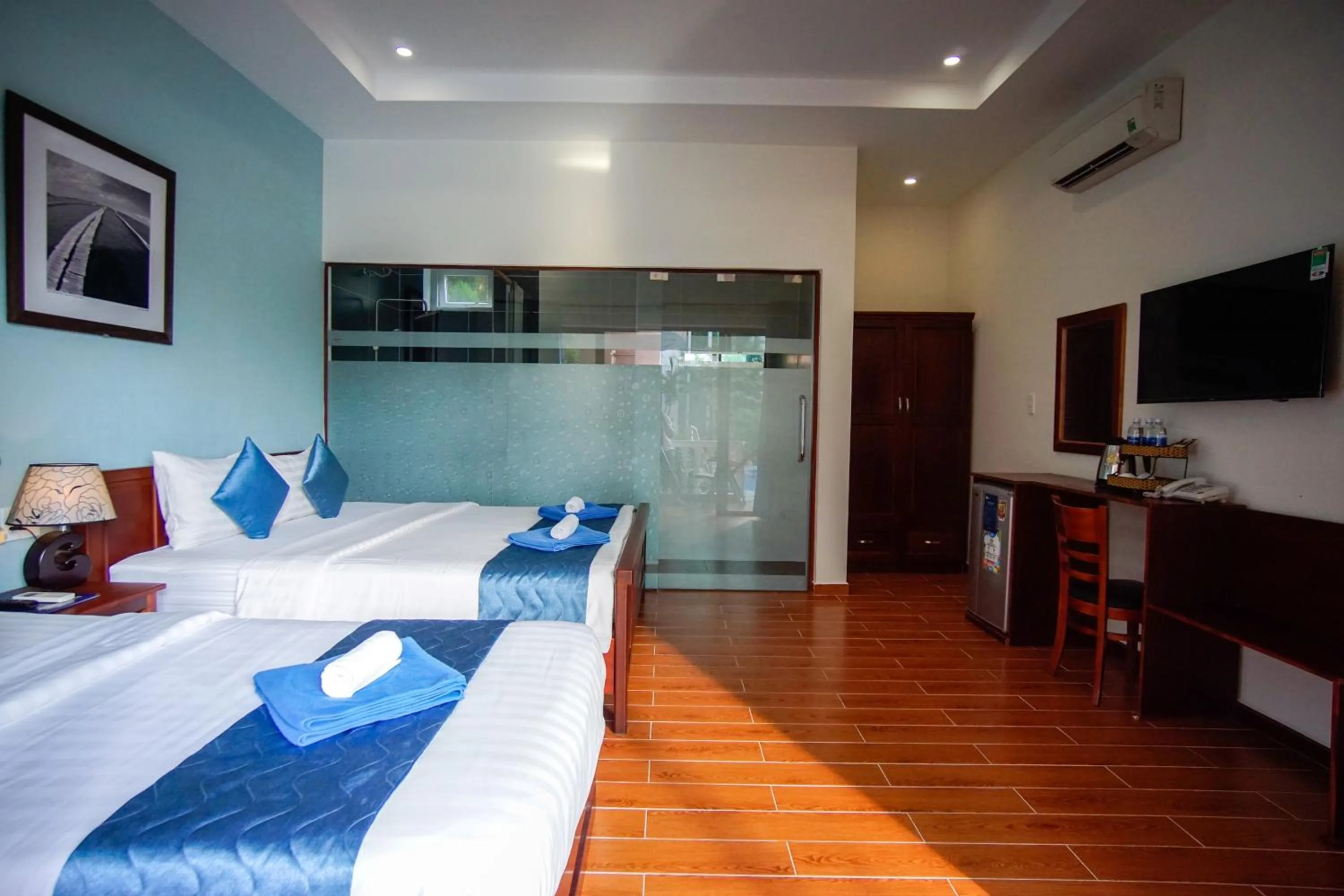 Photo of the whole room, Bed in Brenta Phu Quoc Hotel