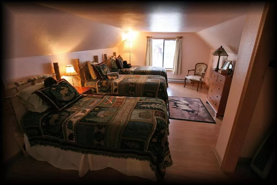 Bed in Alpine Motel of Cooke City