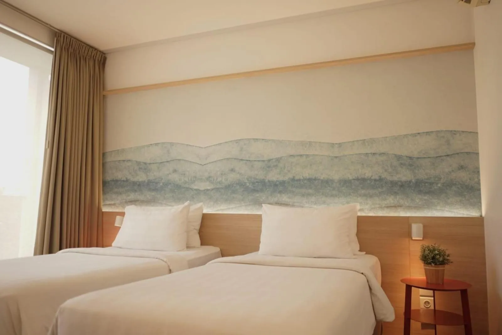 Bed in Malaka Hotel Bandung
