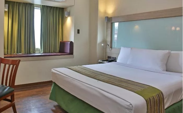 Bed in Microtel by Wyndham Baguio