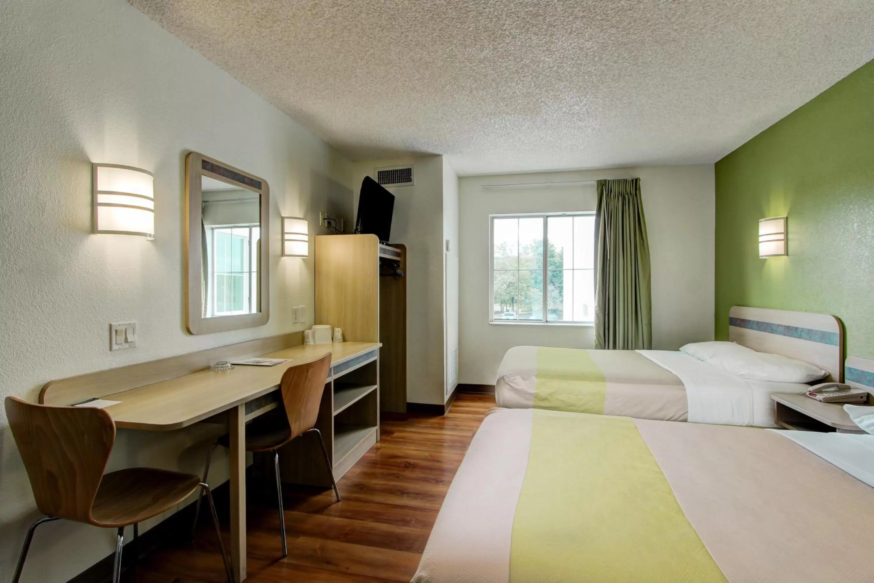 Bed in Super 8 by Wyndham Aurora East