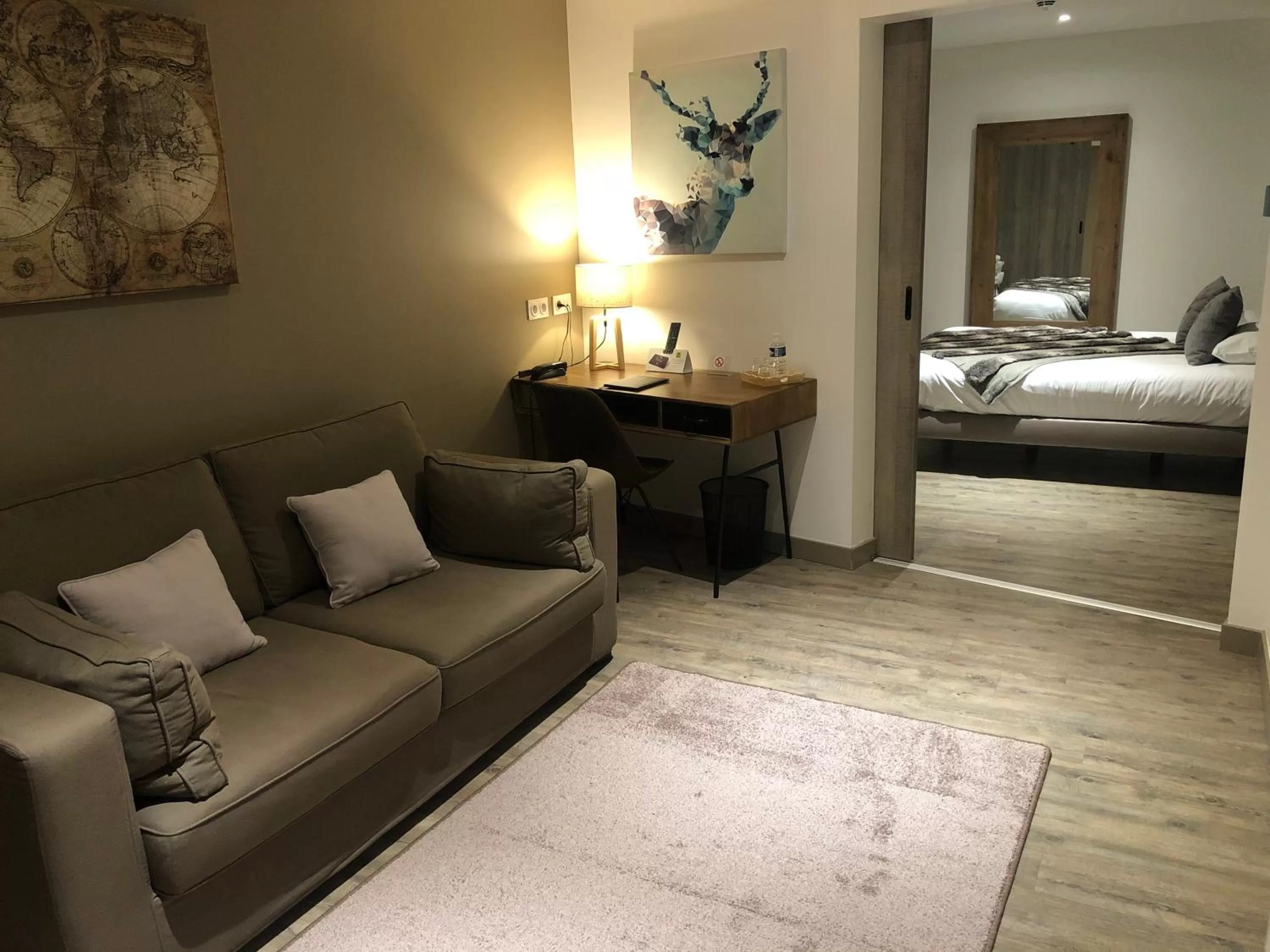 Bed in Logis Hôtel Burnichon