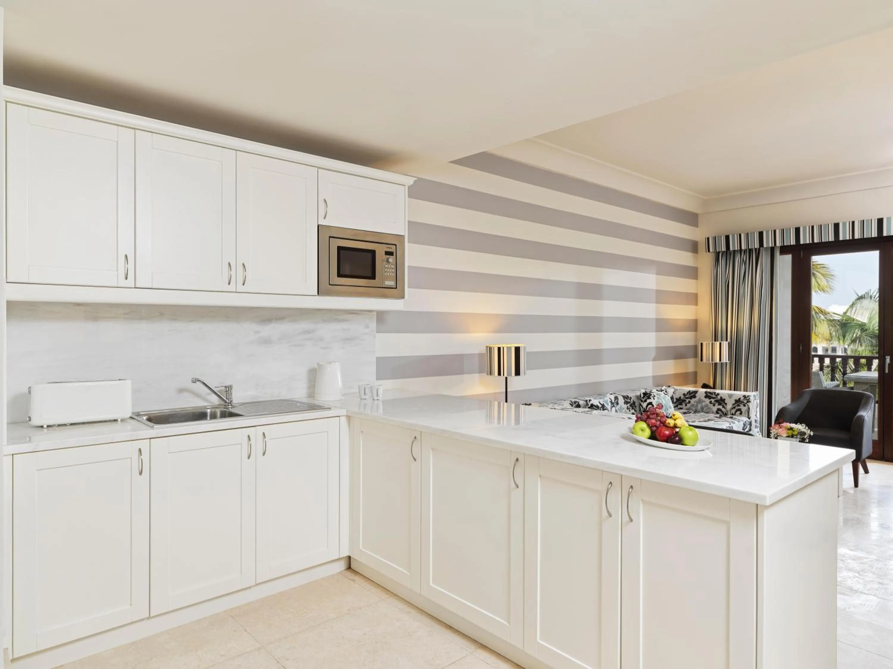 Kitchen or kitchenette in Fanar Hotel & Residences