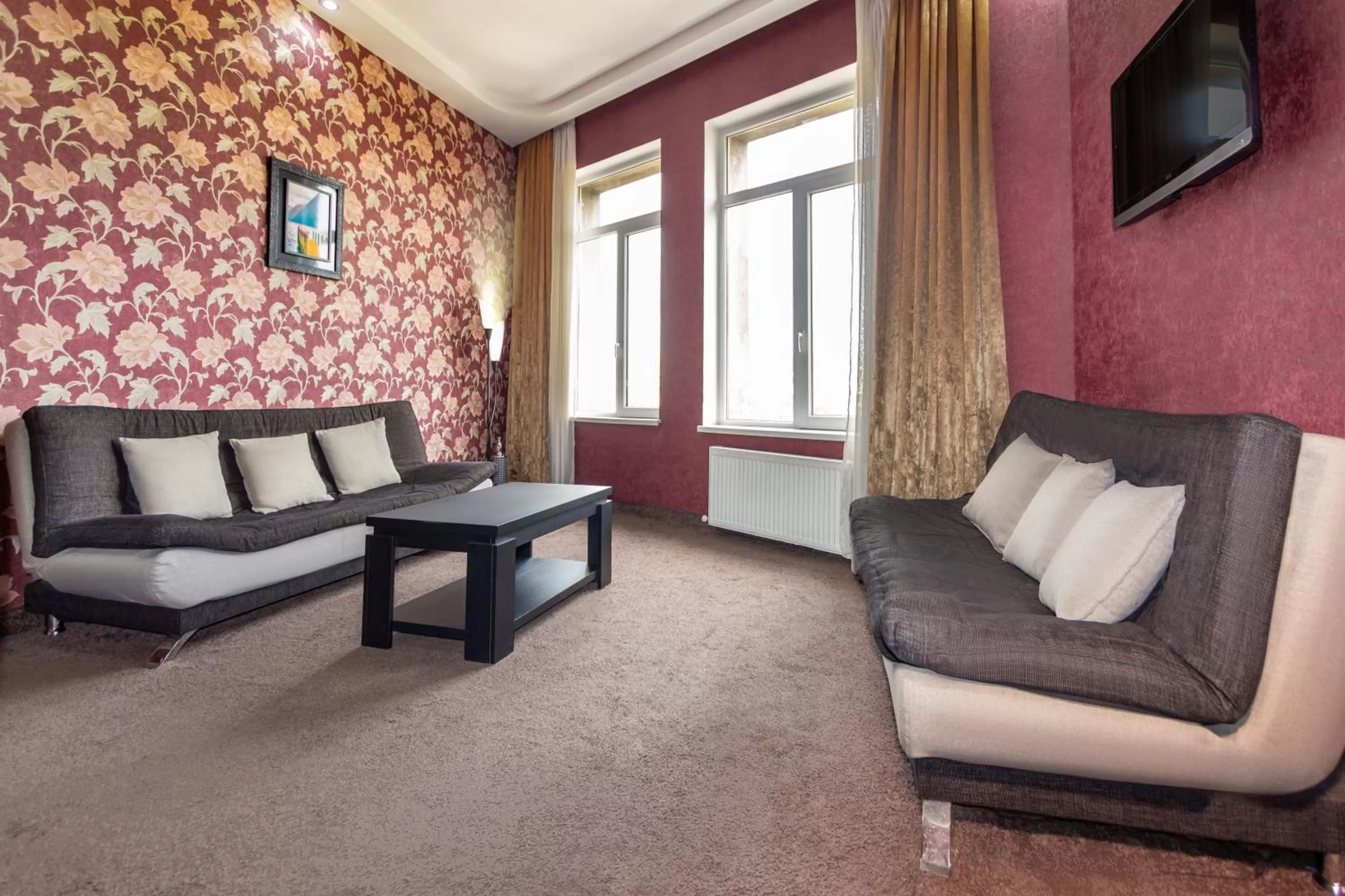 Communal lounge/ TV room, Seating Area in Margo Palace Hotel