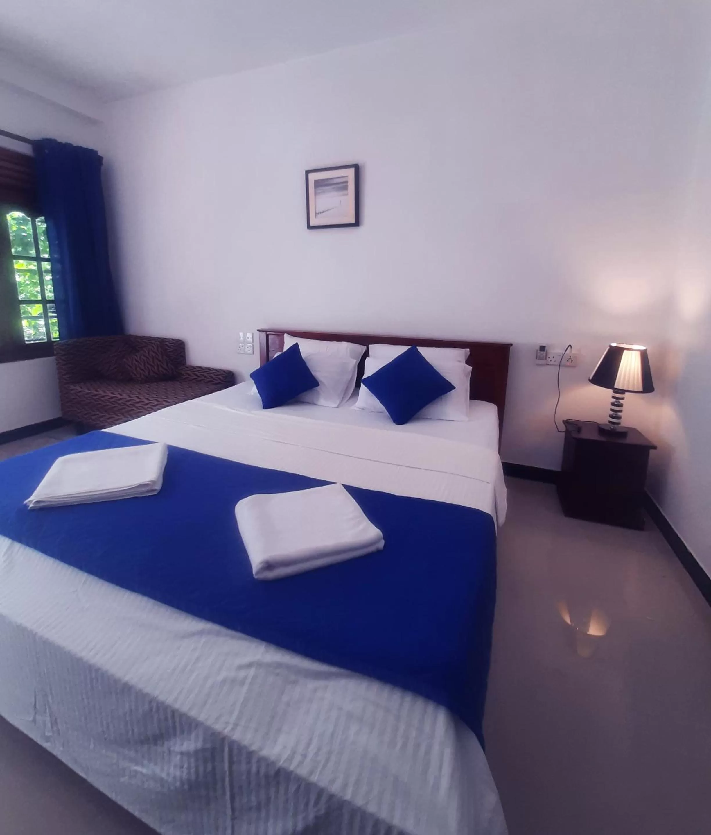 Photo of the whole room, Bed in Mirissa Blue Whale Holiday Hotel