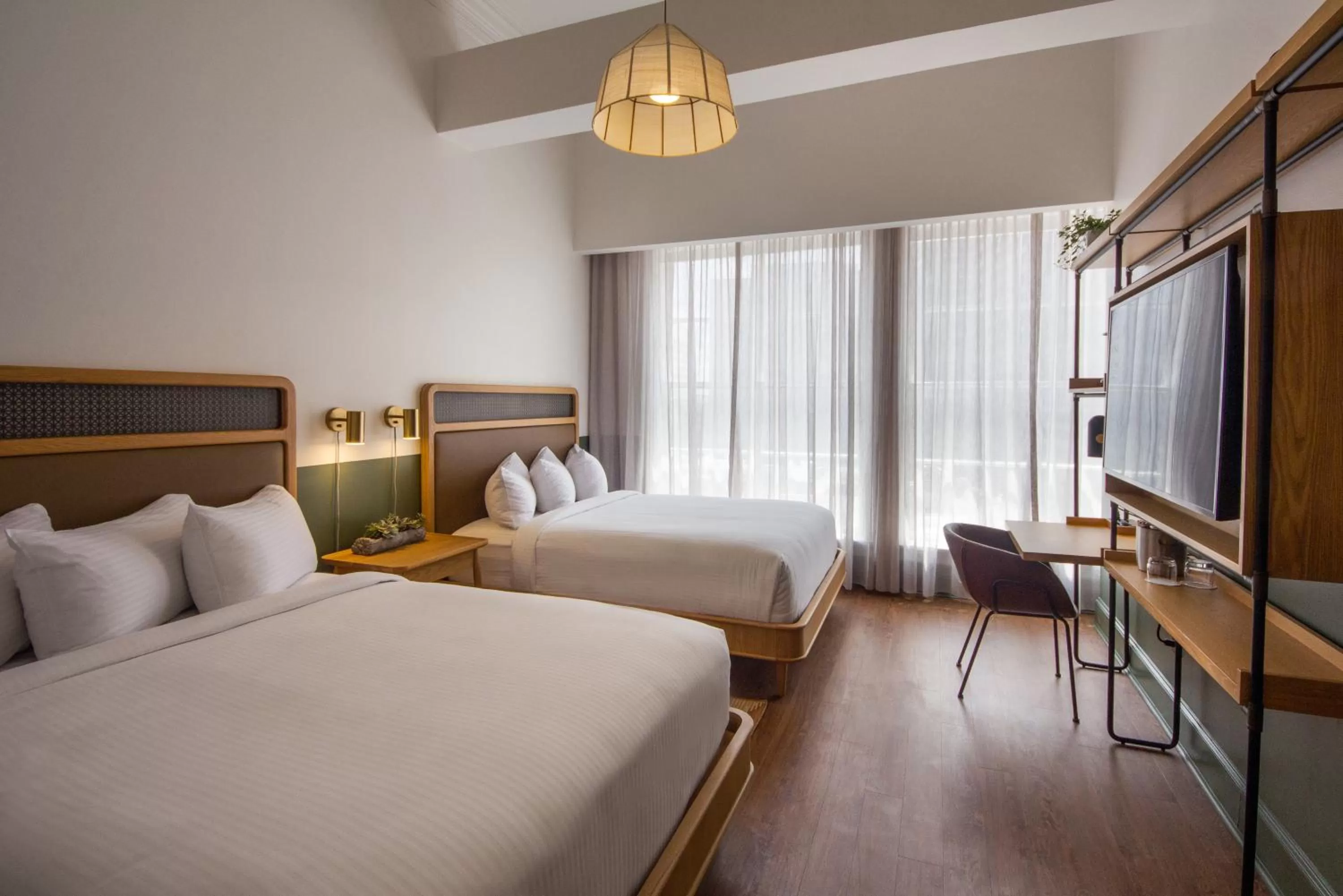 Bed in Hotel Theo New Orleans, Tapestry Collection by Hilton