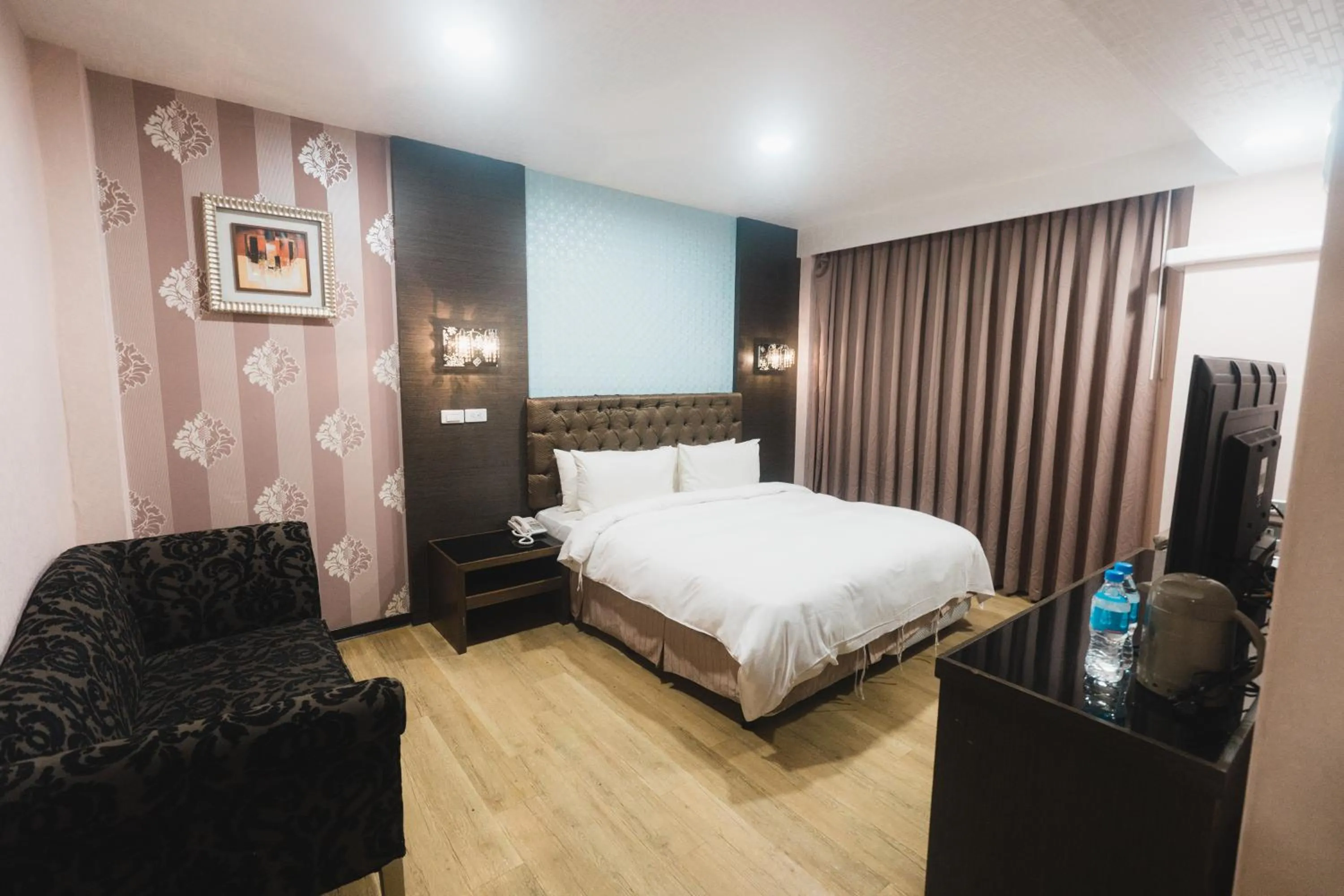 Bed in The Riverside Hotel Fashion