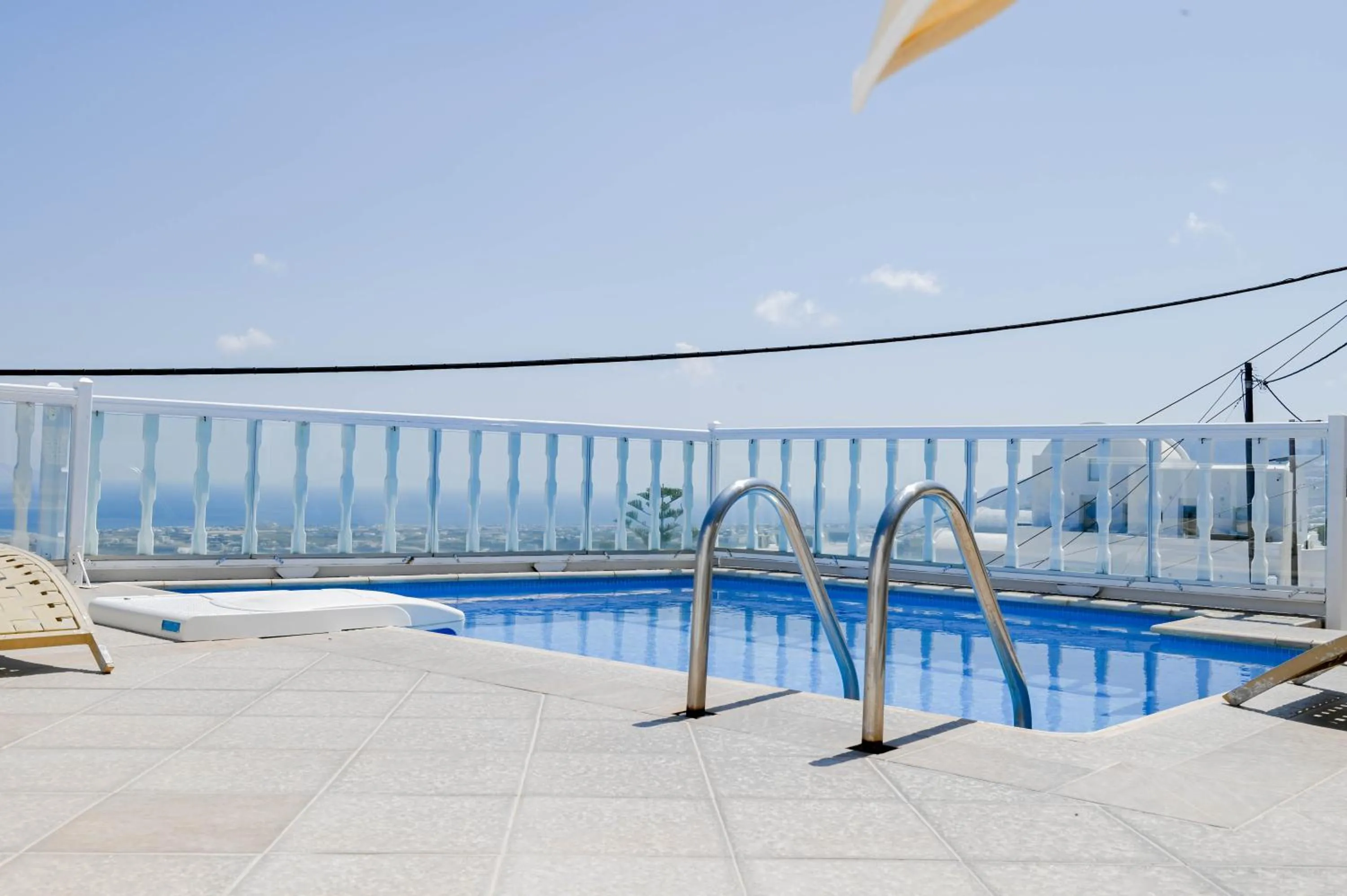 Swimming pool in Amerisa Suites & Villa