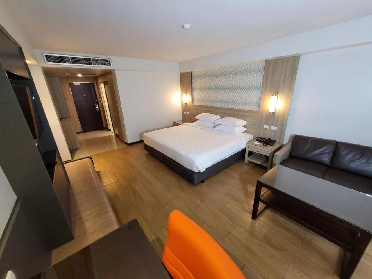 Bed in Dynasty Grande Hotel