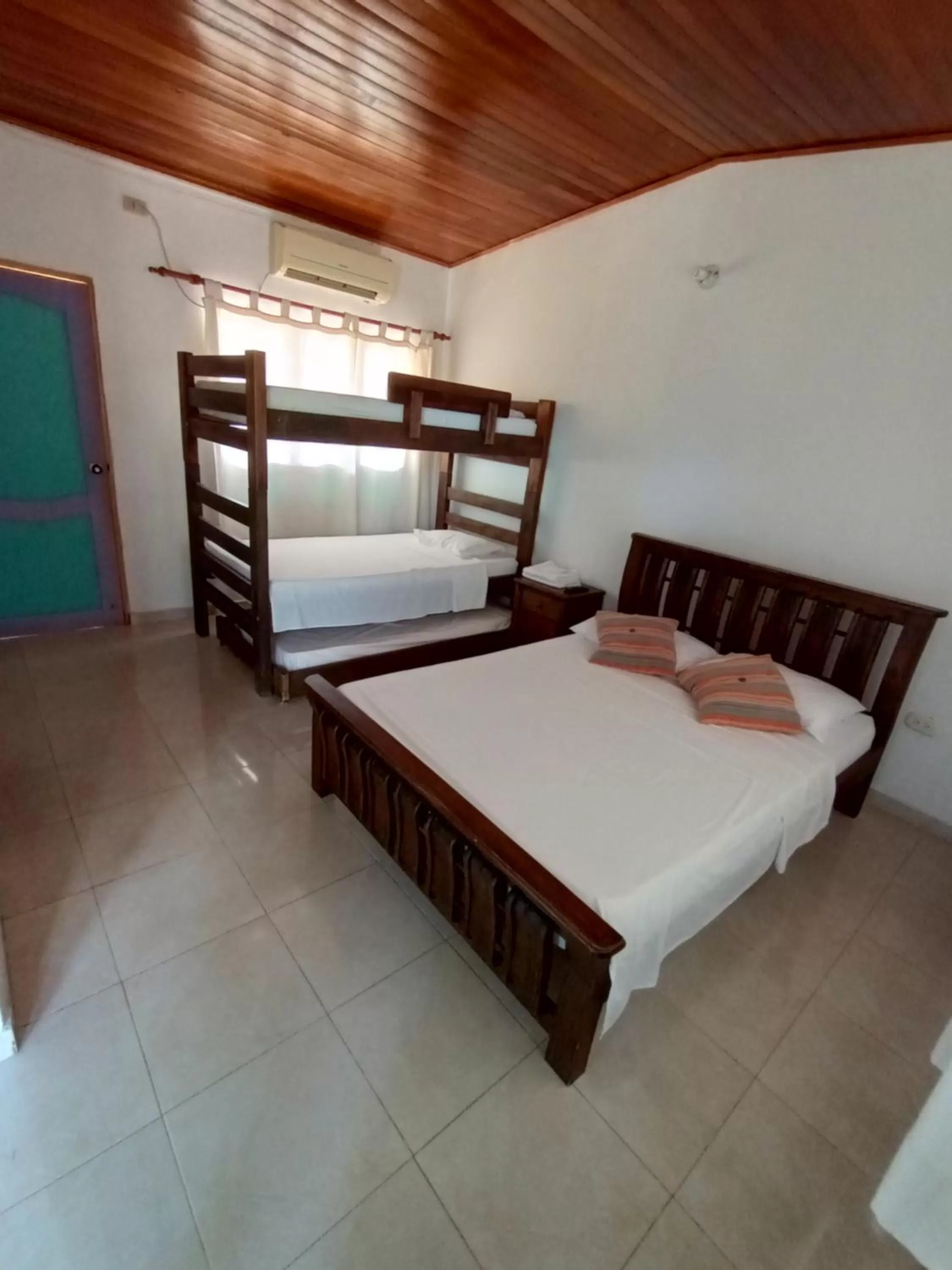 Bed, Bunk Bed in Hotel Brisas De Neguanje