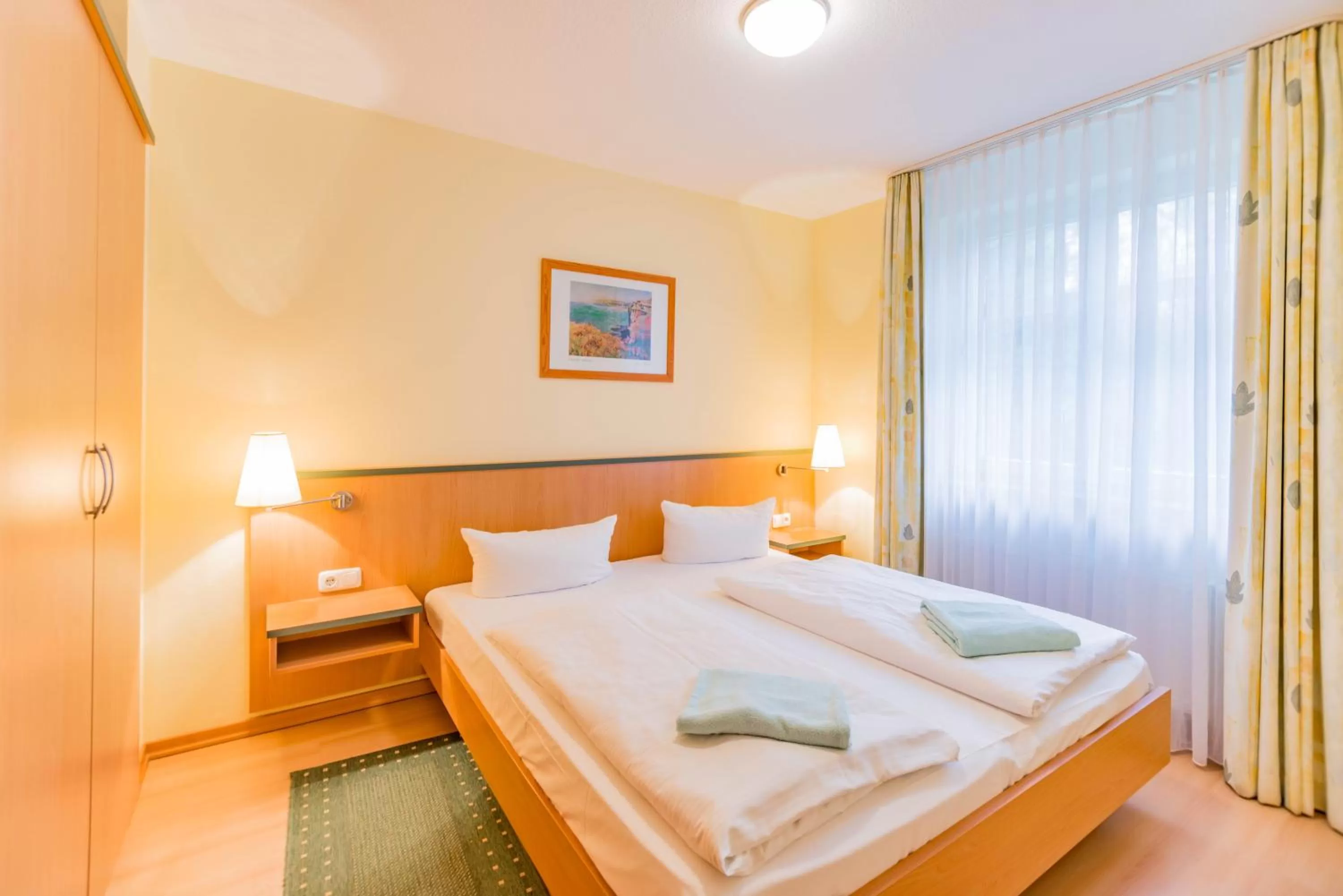 Photo of the whole room, Bed in Am Weststrand Apartmenthaus Waldeck