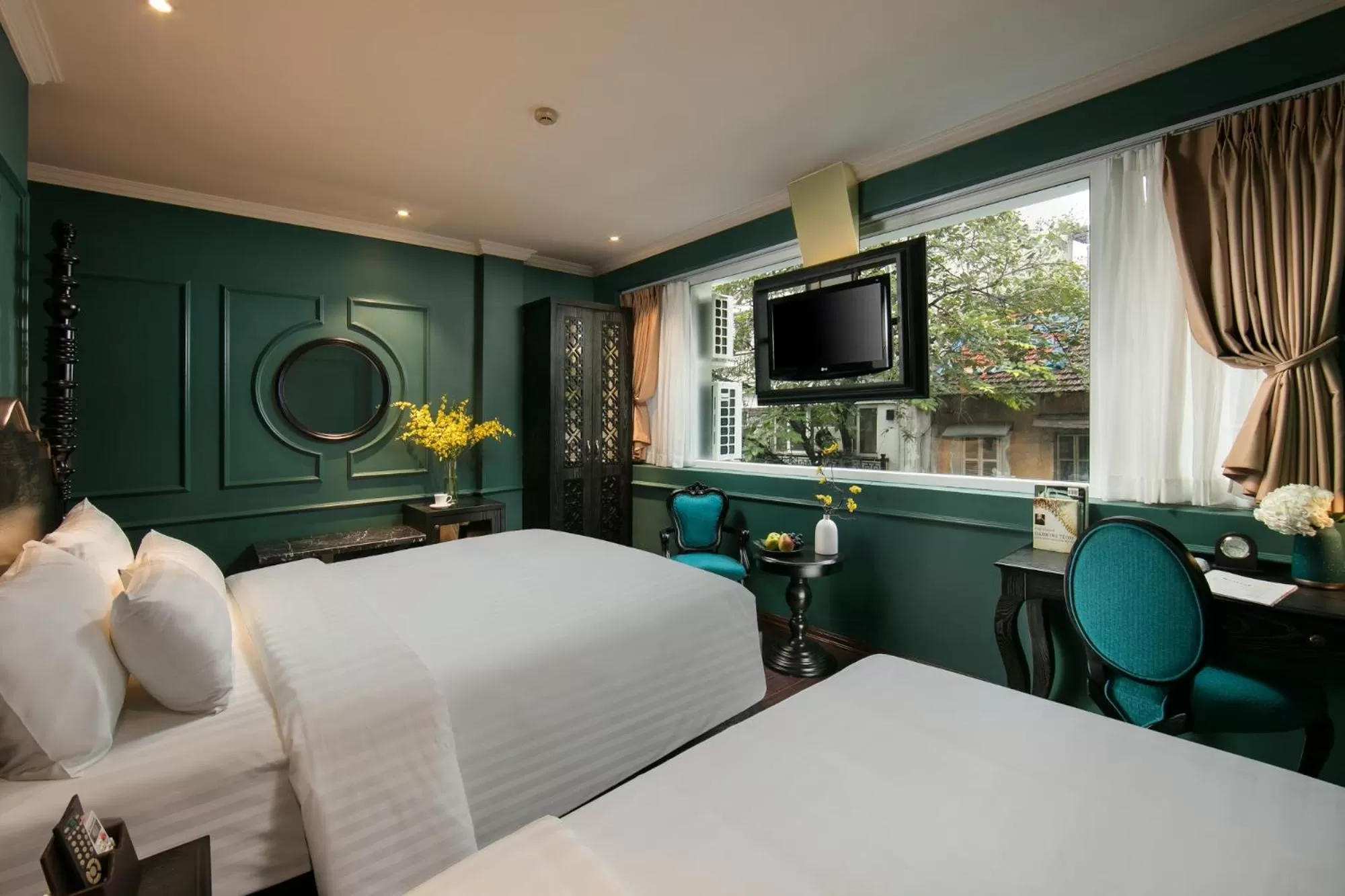 Bed in Grande Collection Hotel & Spa