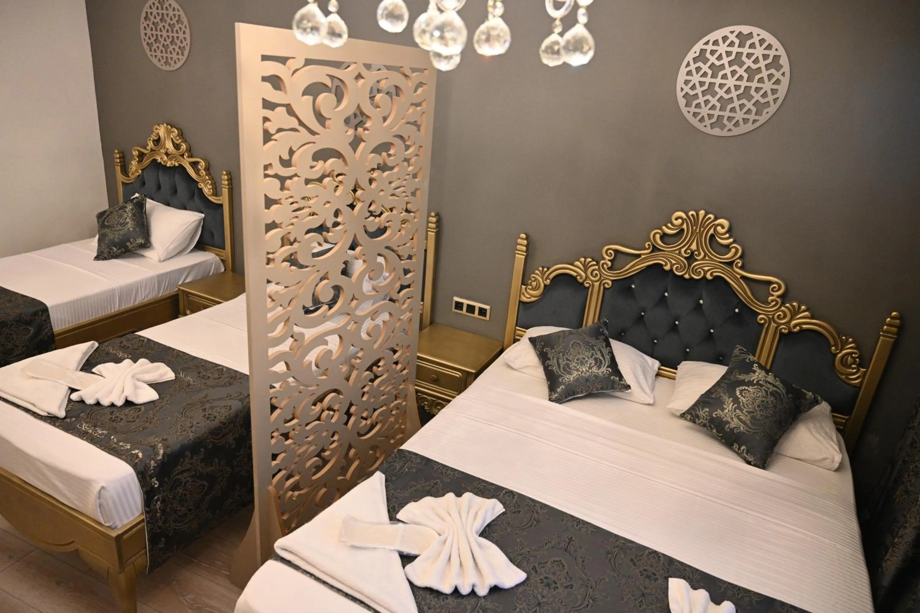 Bed in Ethnica Suites