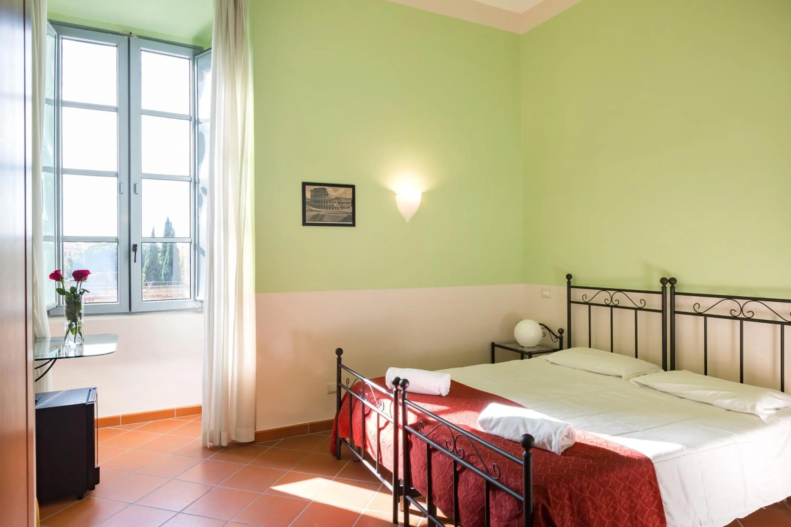 Photo of the whole room, Bed in Domus Sessoriana