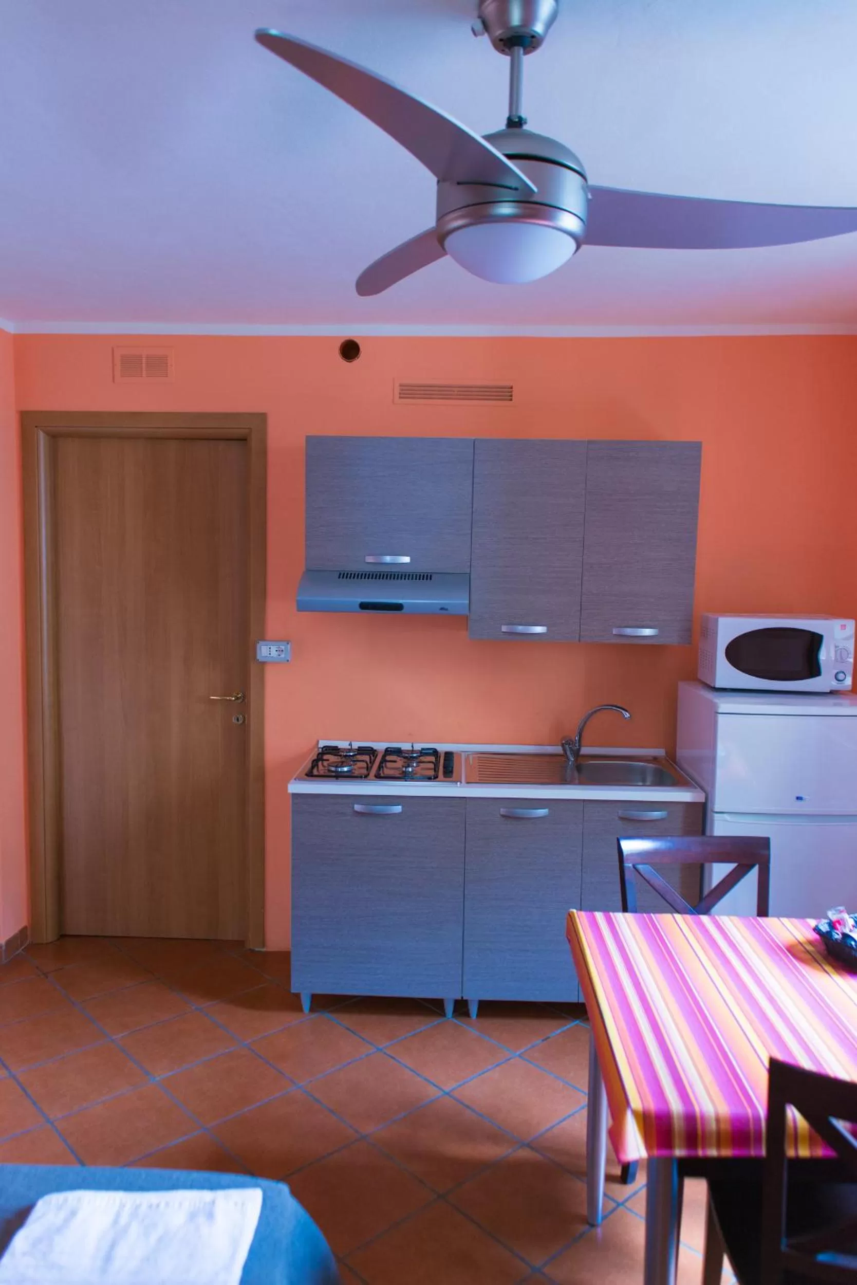Kitchen or kitchenette in Al Cardinale Rooms & Studios