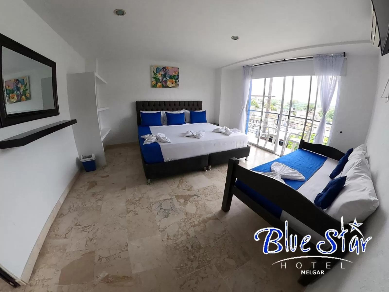 Bed in Blue Star Hotel