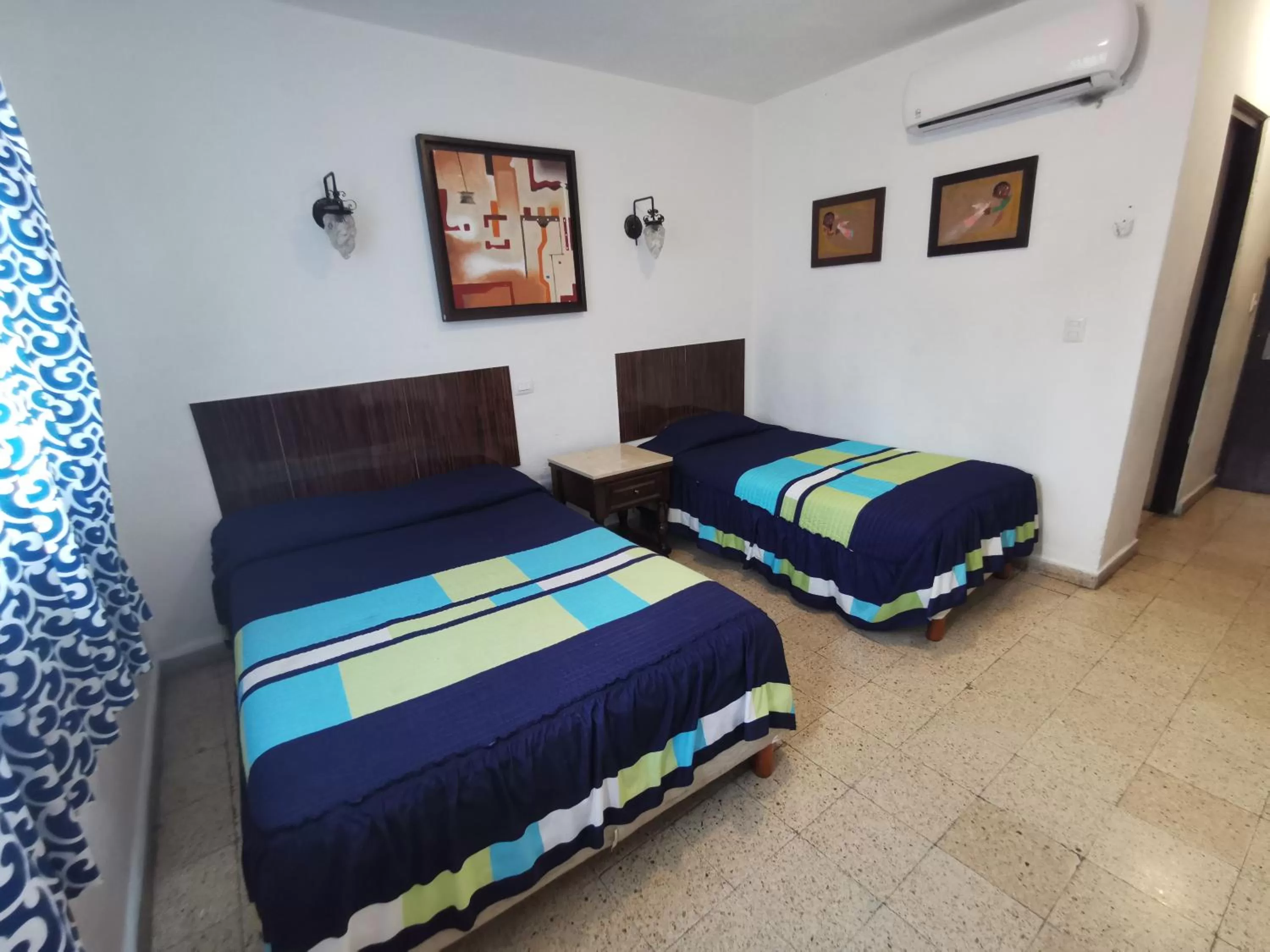 Bed in Hotel Las Dalias Inn