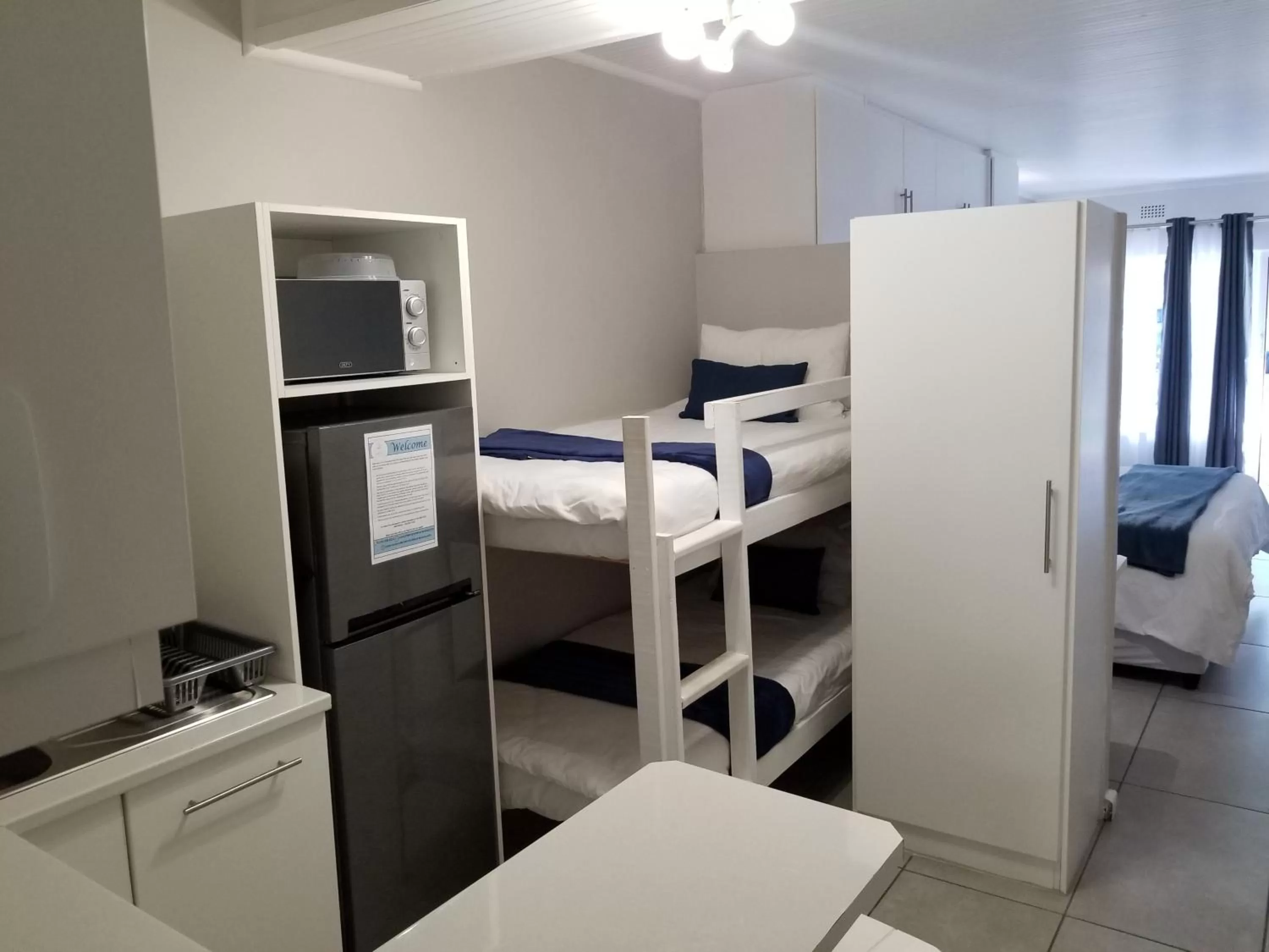 Kitchen or kitchenette, Bed in Riviera Hotel Hartenbos