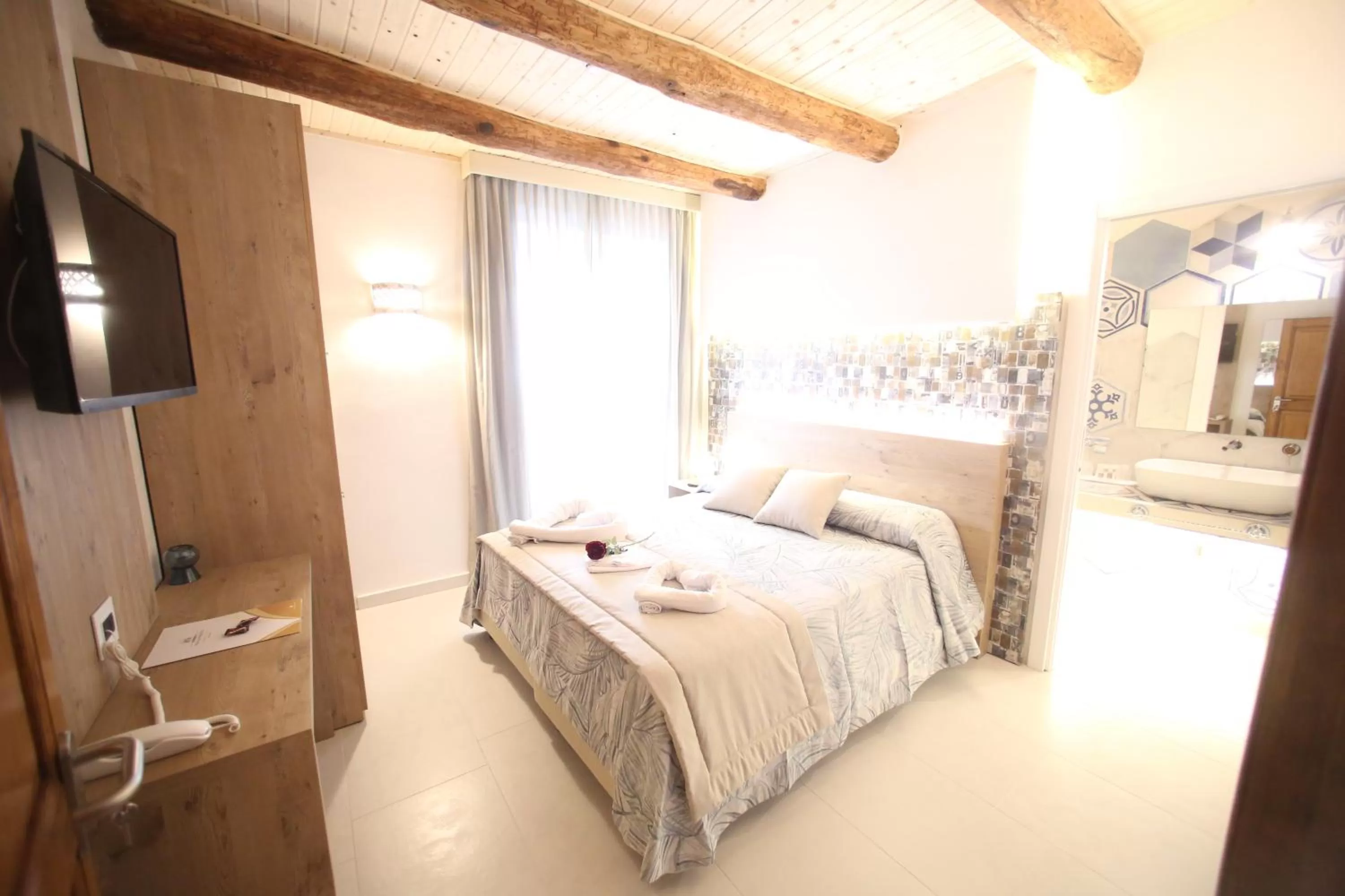 Bed in Relais Piazza Del Plebiscito B&B