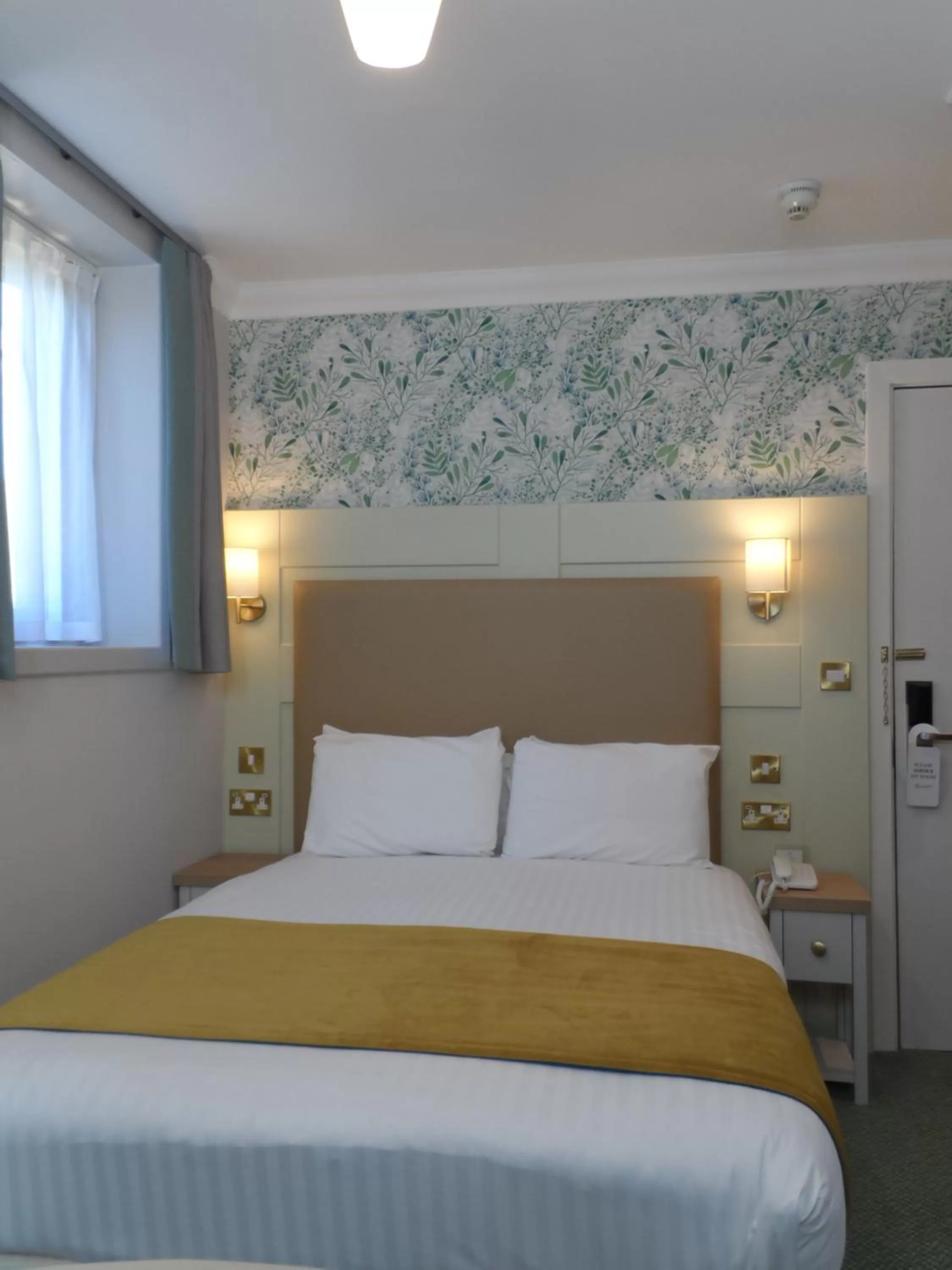 Bed in Stanton House Hotel