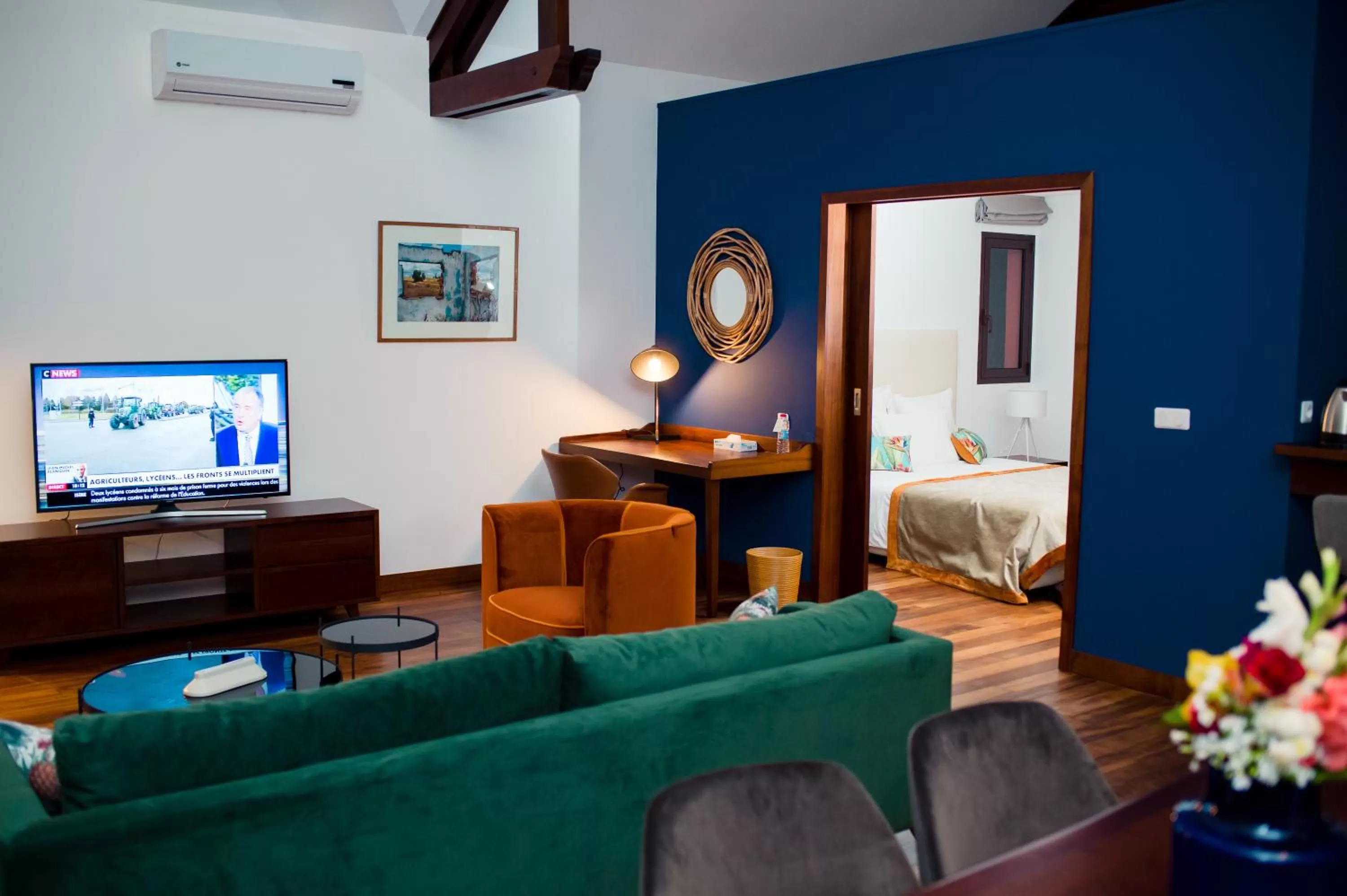 Bed, Seating Area in La Varangue