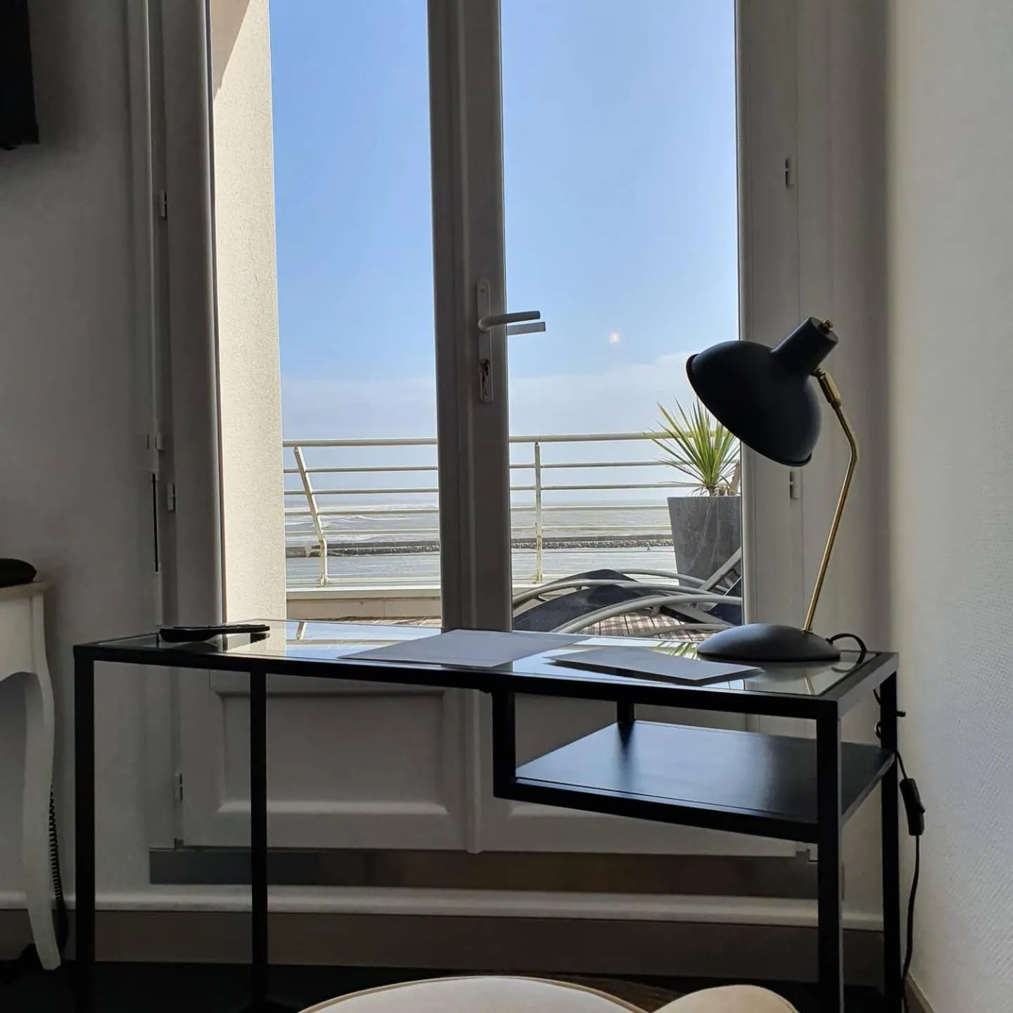 Seating area in Logis Hôtel Sea View