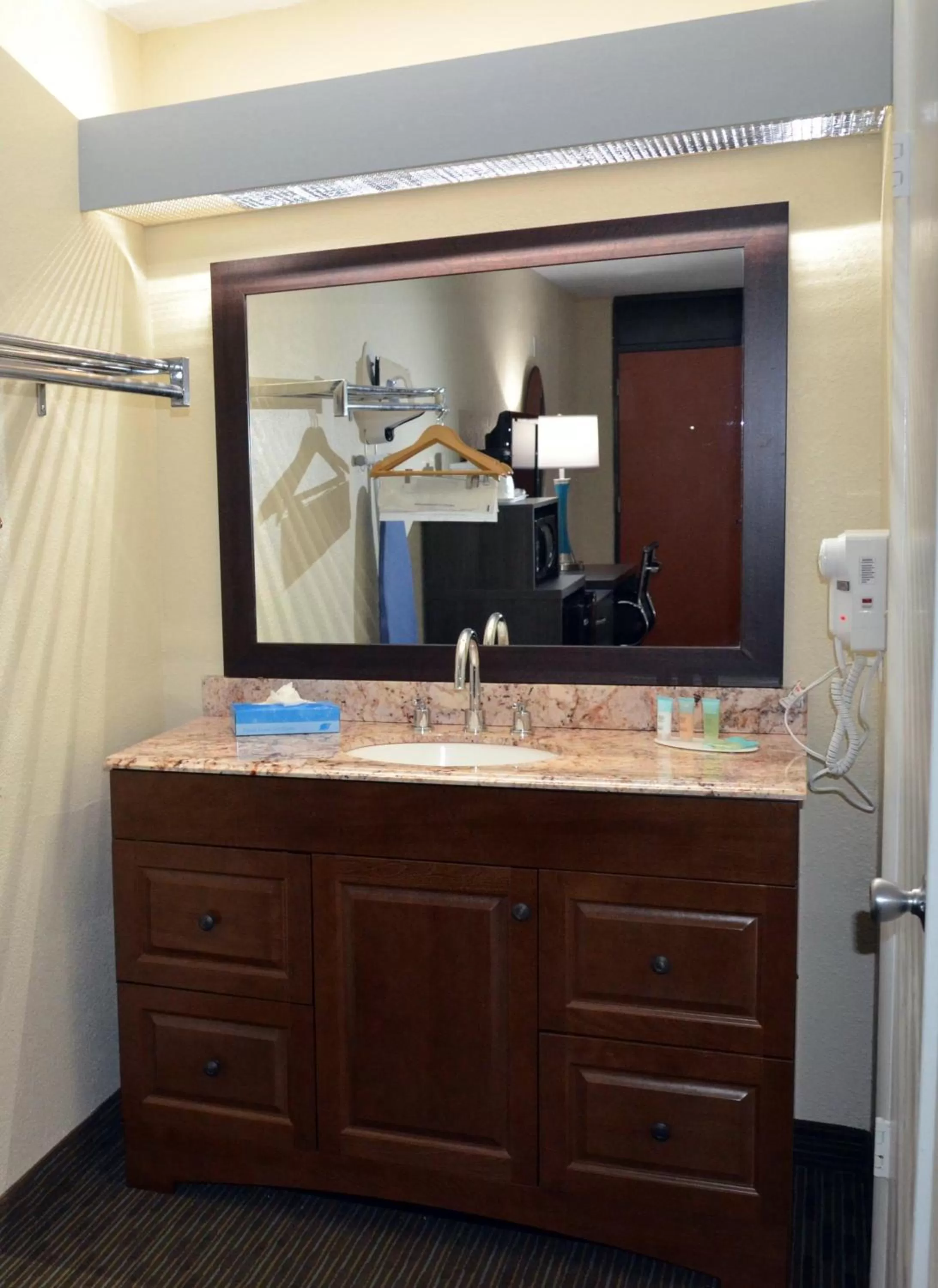 Bathroom in Days Inn & Suites by Wyndham Orlando Airport