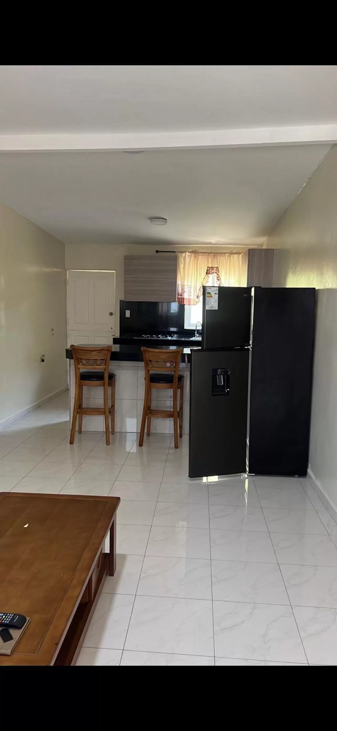 Kitchen/Kitchenette in Curasita colour Appartments