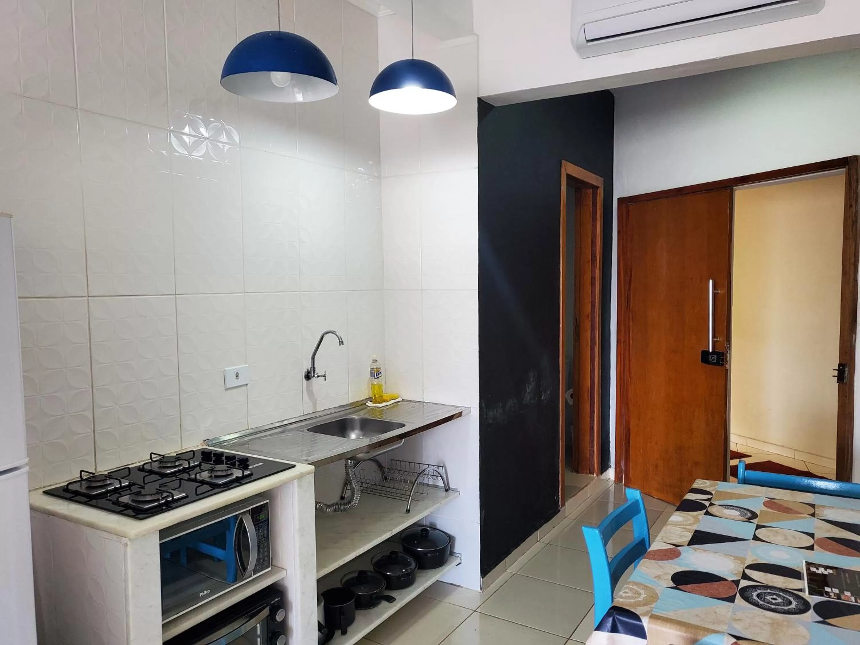 Kitchen or kitchenette in Apartamentos Casa da Pedra