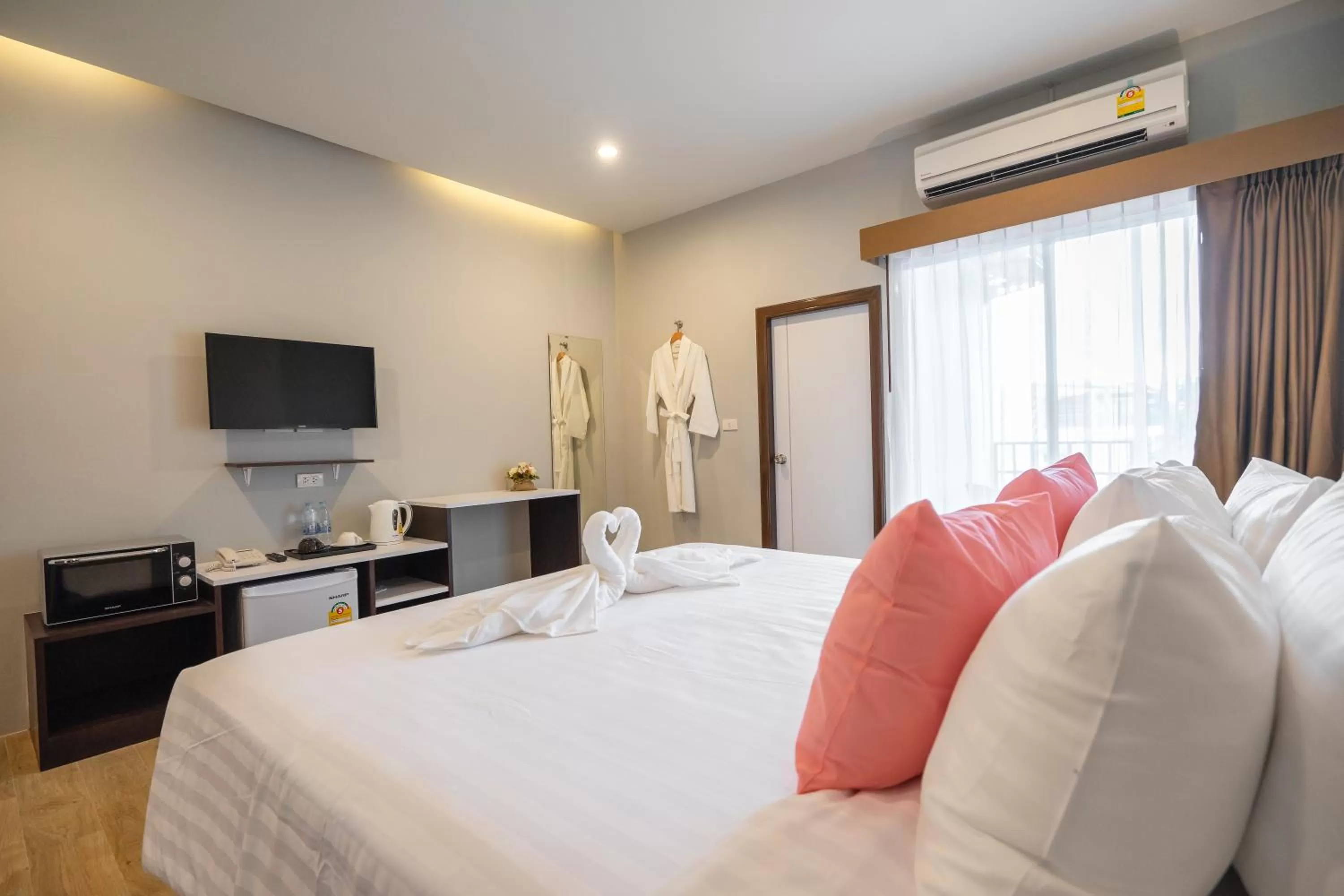Bed in U- Homehotel Nakhonpanom