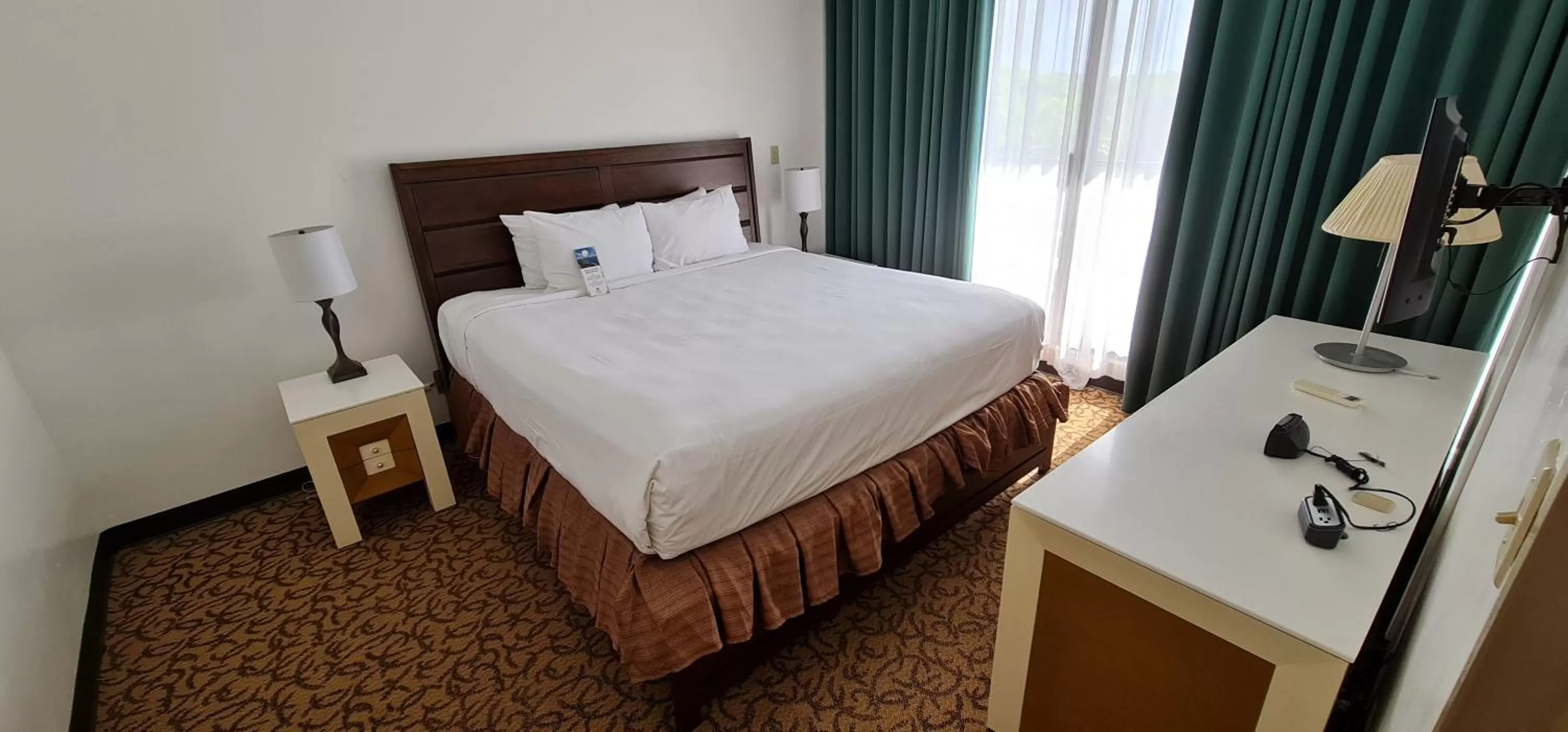 Junior Suite with King Bed and Living Area in SureStay Hotel by Best Western Guam Palmridge