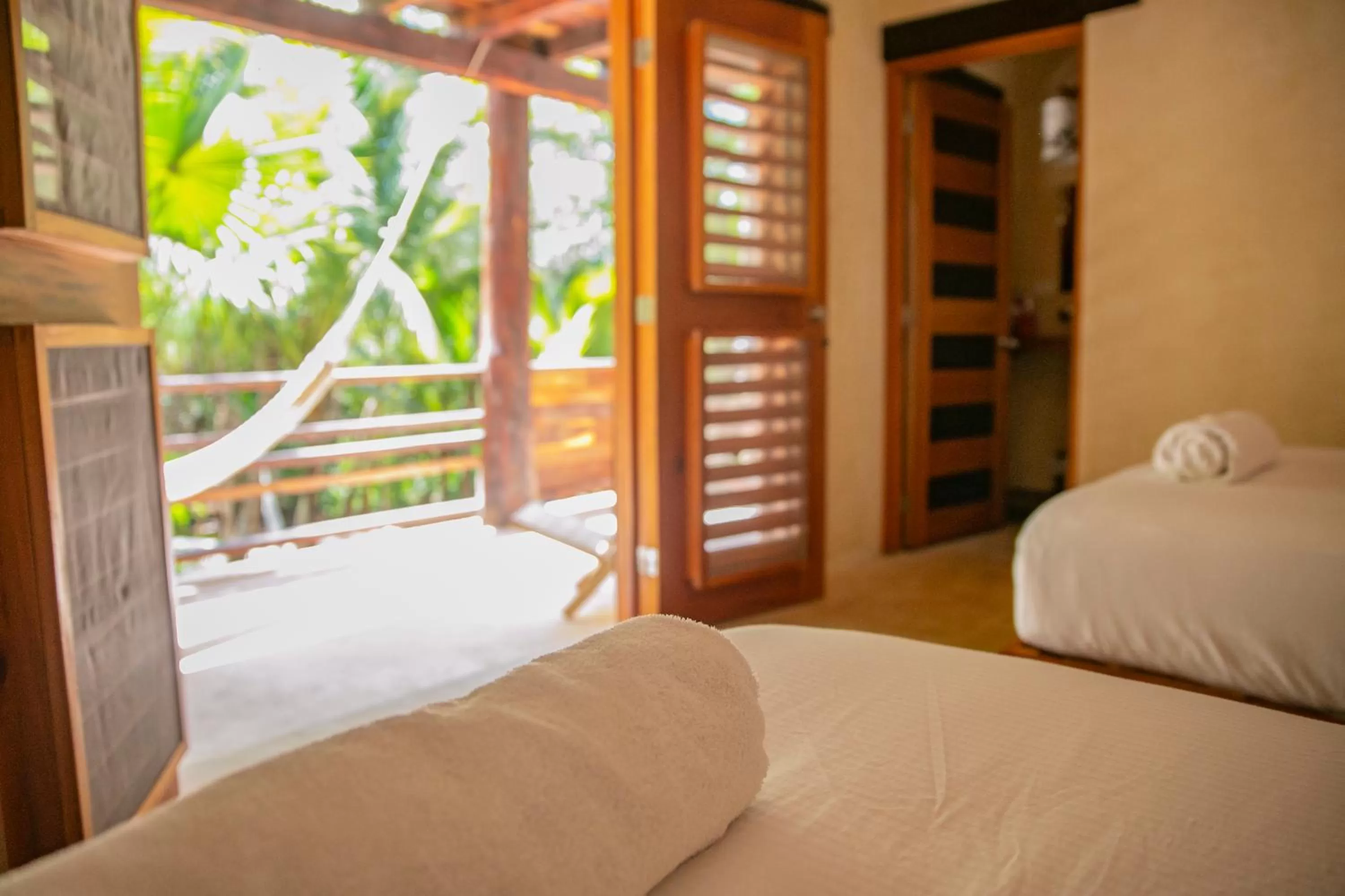Bed in Hotel Buenavista Bacalar Jungle Experience