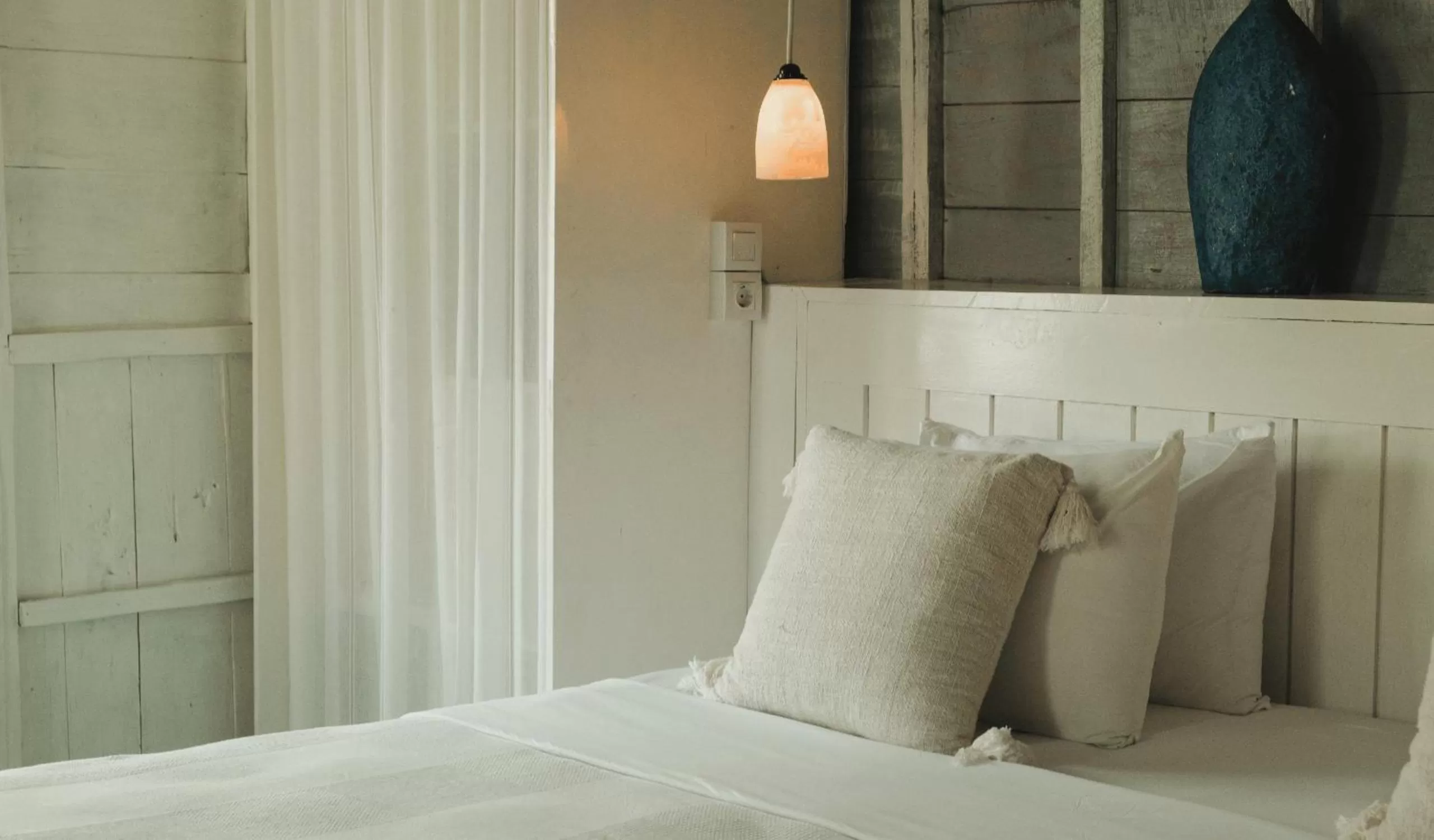 Bed in The Shacks at Sandy Bay